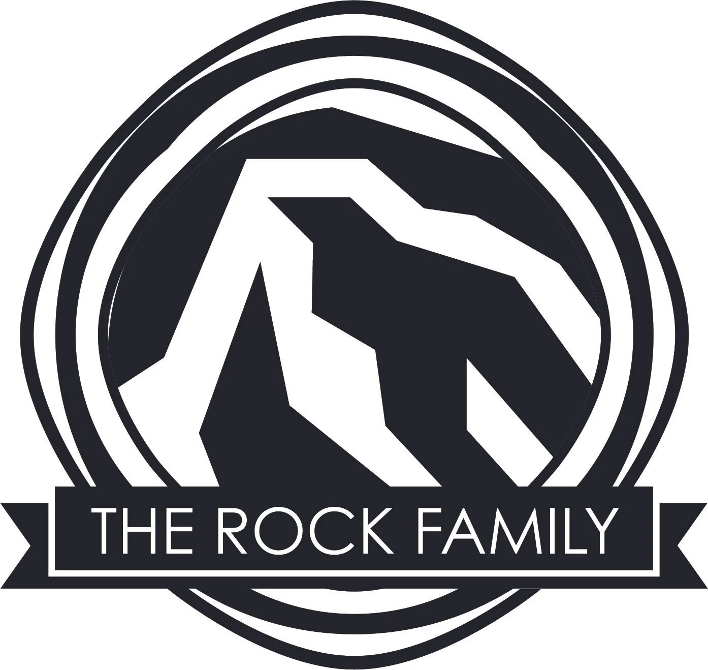 A circular logo with a mountain and sunset design, containing the text 'The Rock Family' at the bottom.