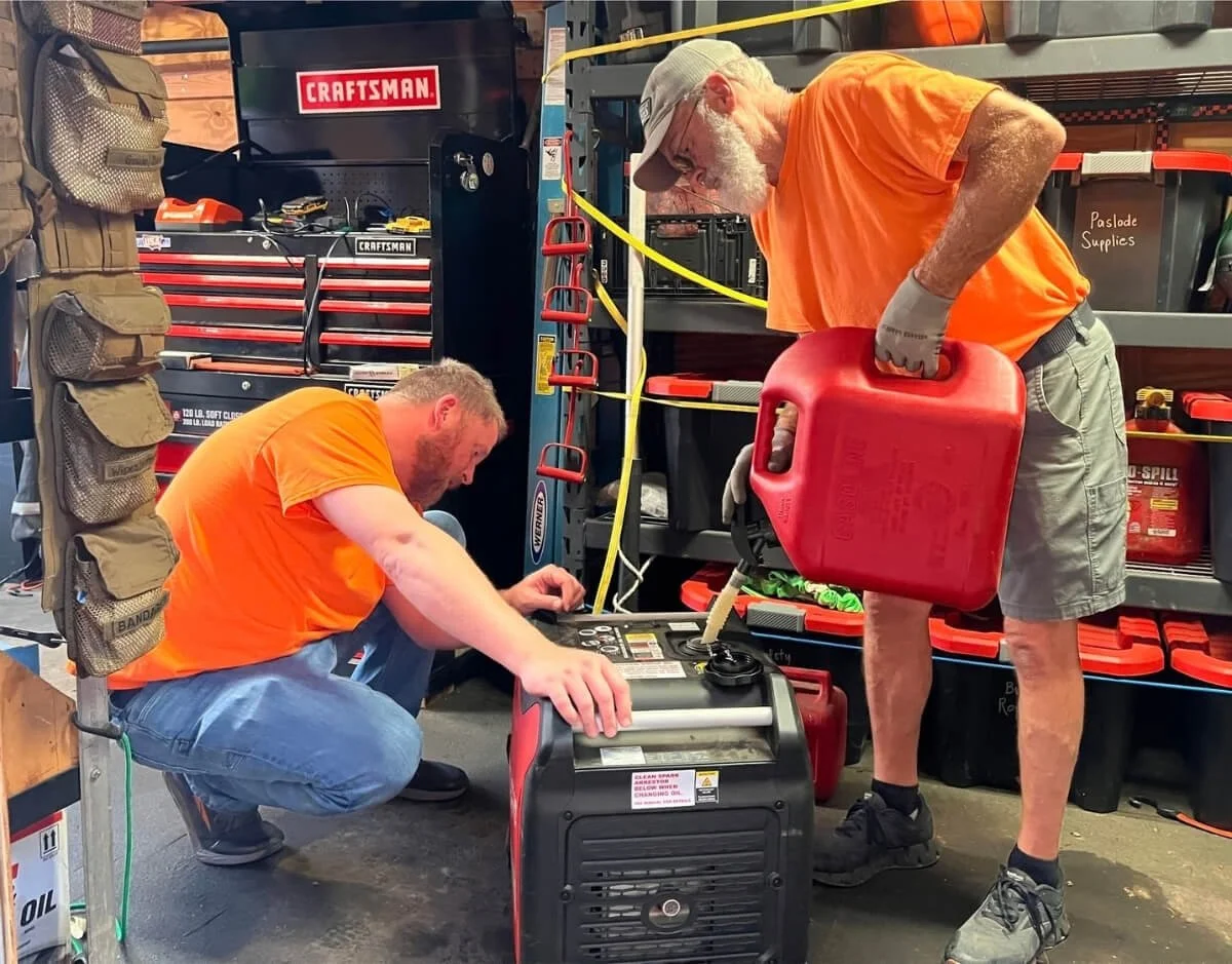 PAR volunteers servicing generators