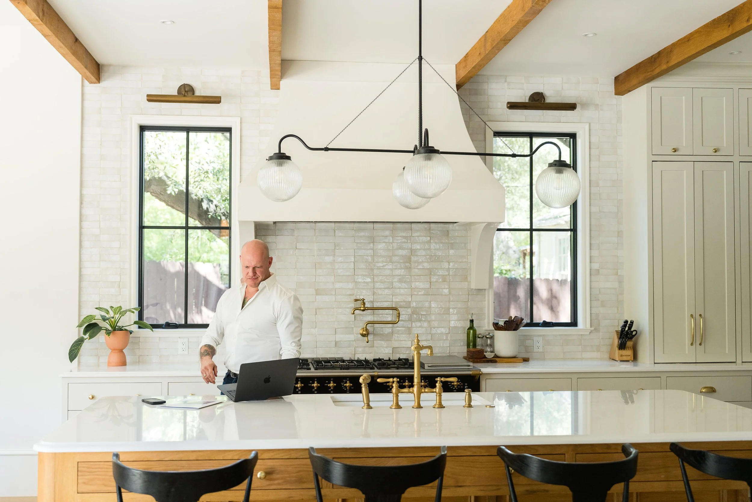 Justyn LeFebvre of Live Well Group in luxury kitchen in Austin, Texas.