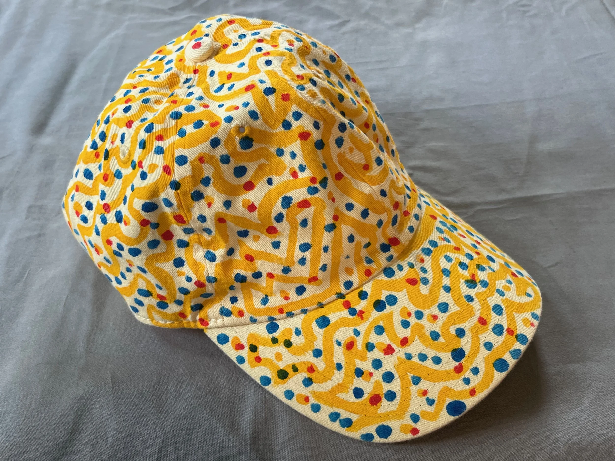 Hand-Painted Yellow/Blue Swirly Cap