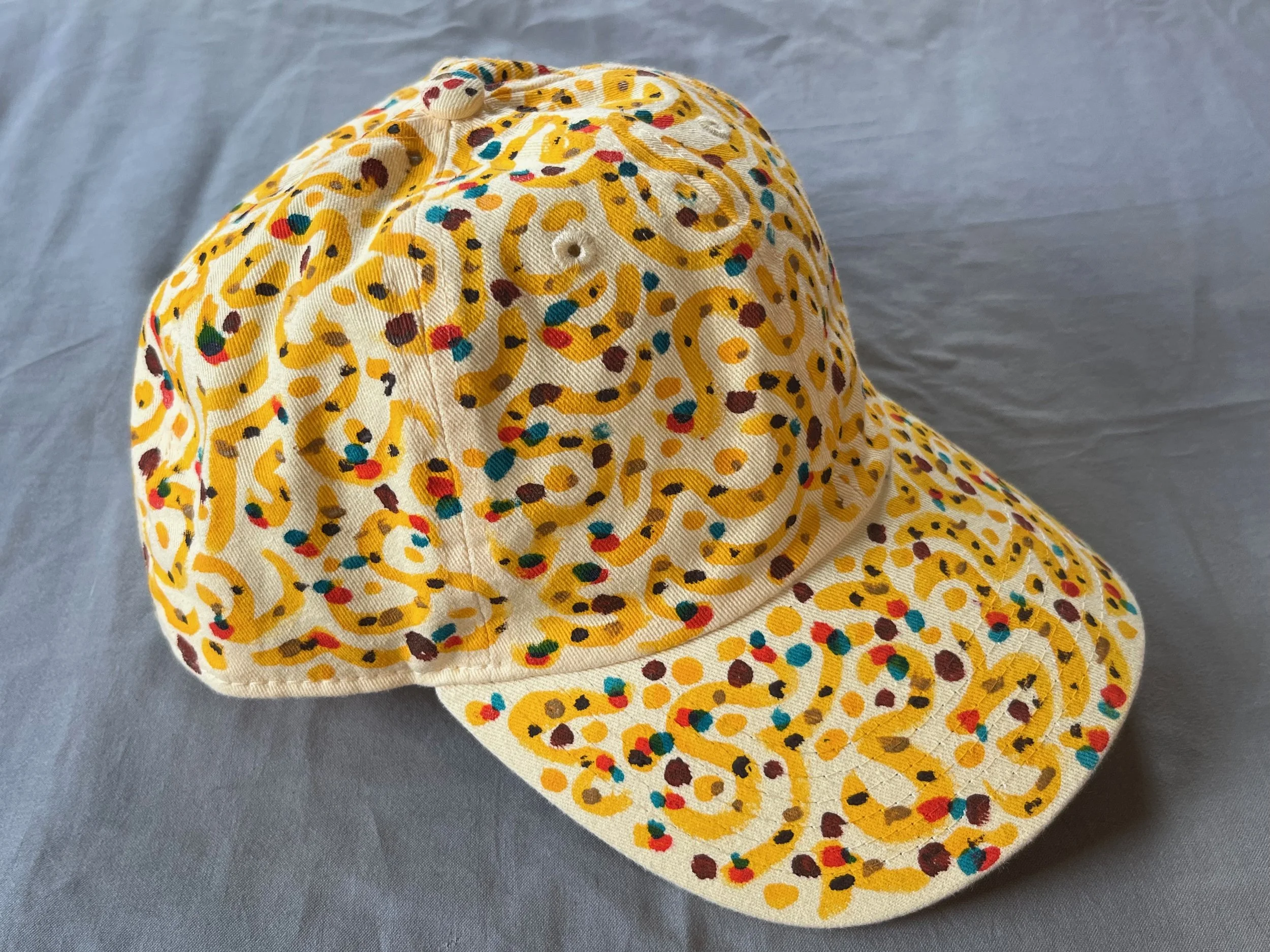 Hand-Painted Light Yellow Swirly Cap