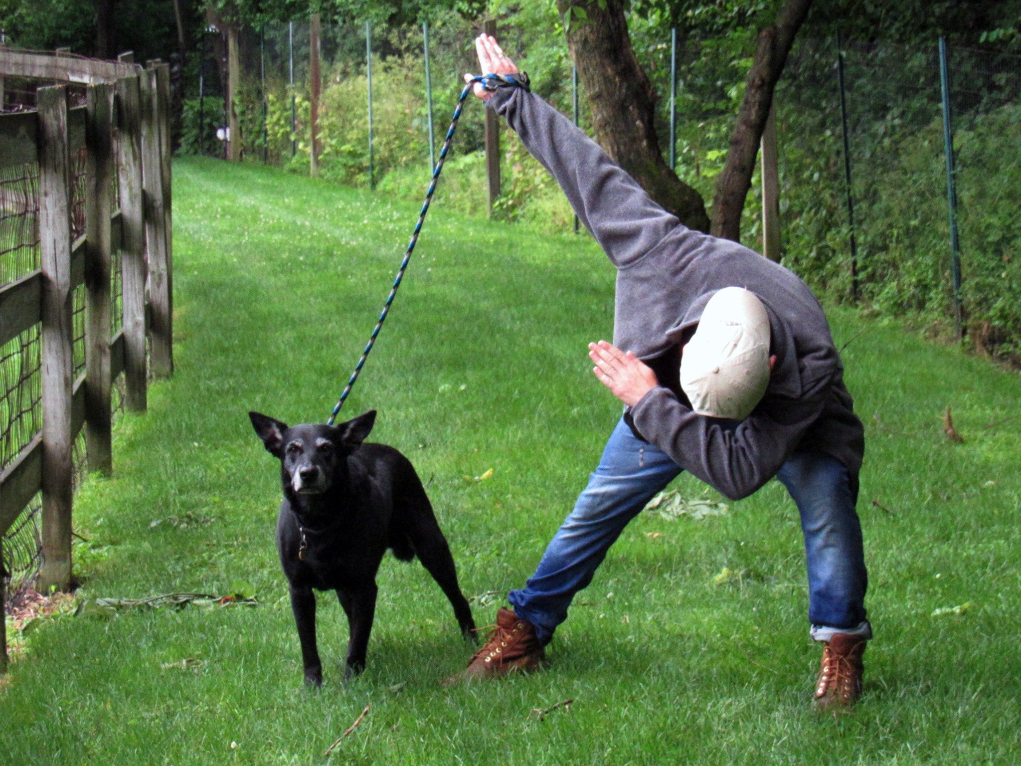 David Scott Weitz photographing a staff member with a dog at Janry Pet Resort 