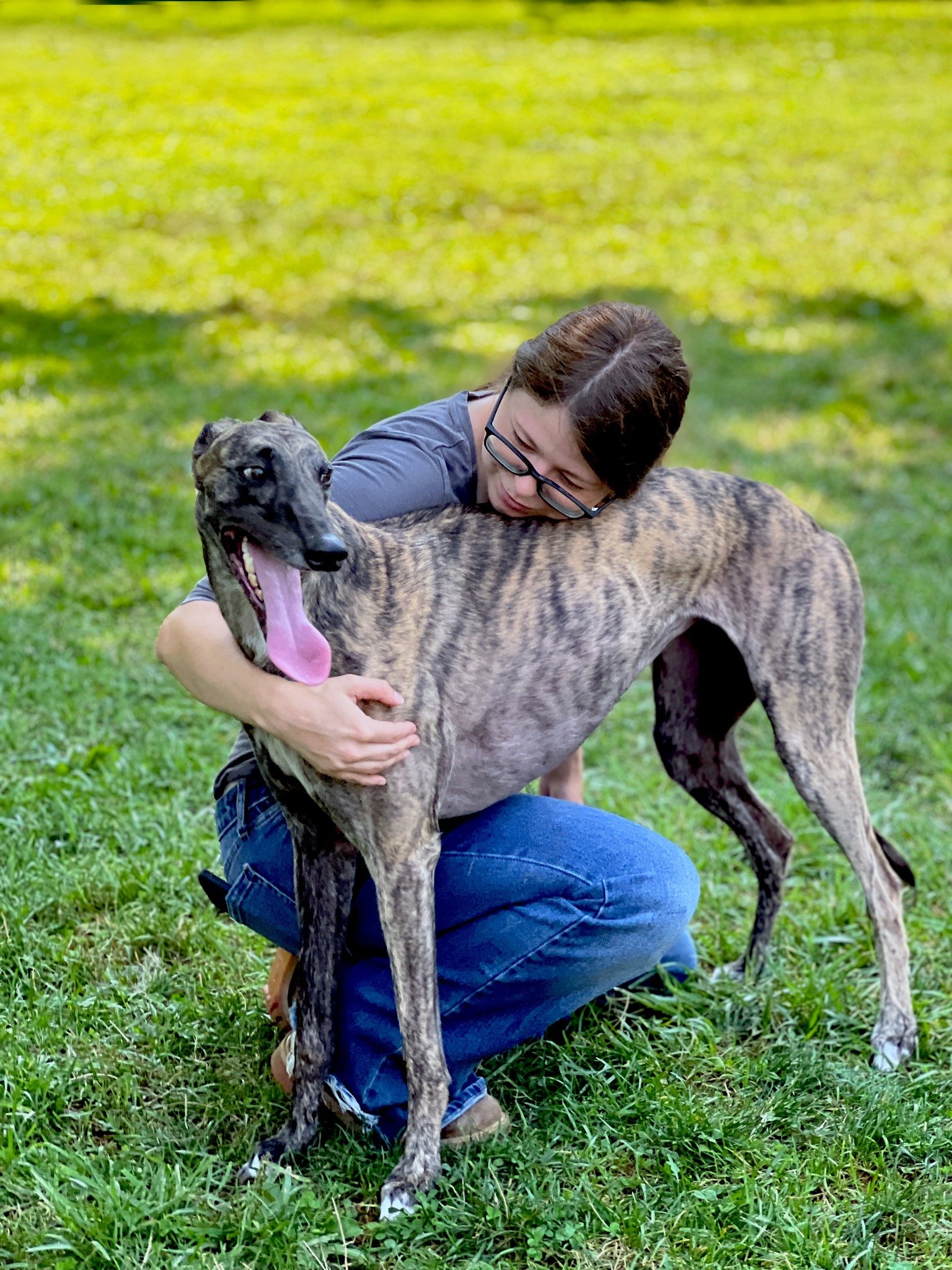 David Scott Weitz photographing a staff member with a dog at Janry Pet Resort 