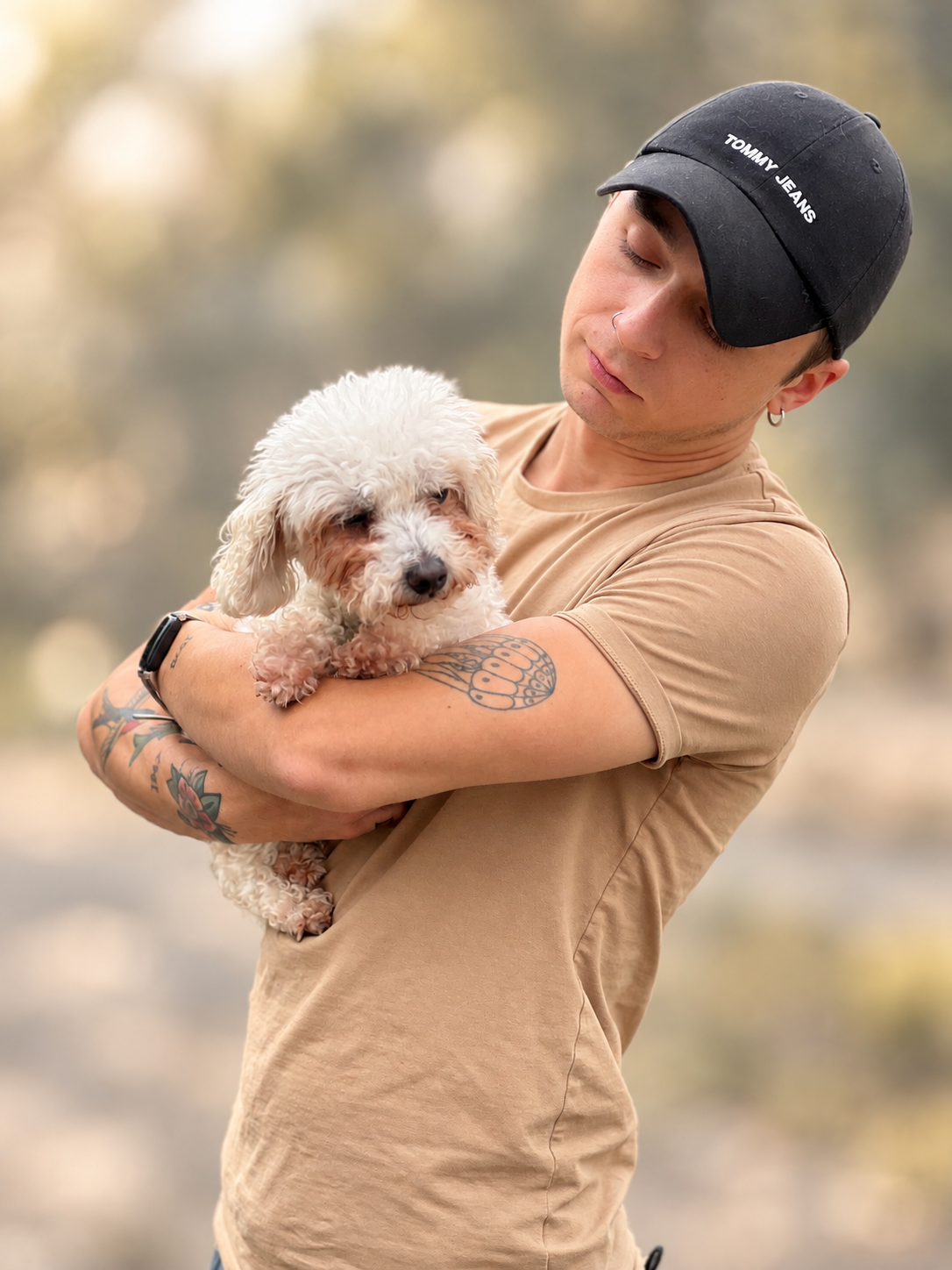 David Scott Weitz photographing a staff member with a dog at Janry Pet Resort 