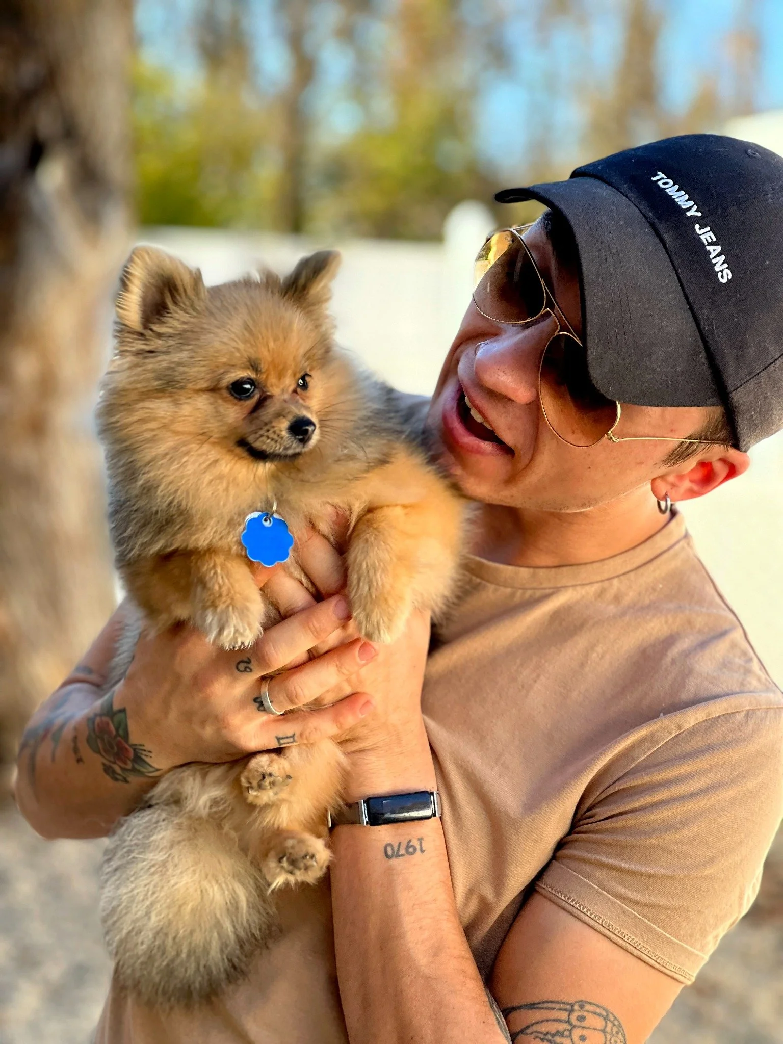 David Scott Weitz photographing a staff member with a dog at Janry Pet Resort 