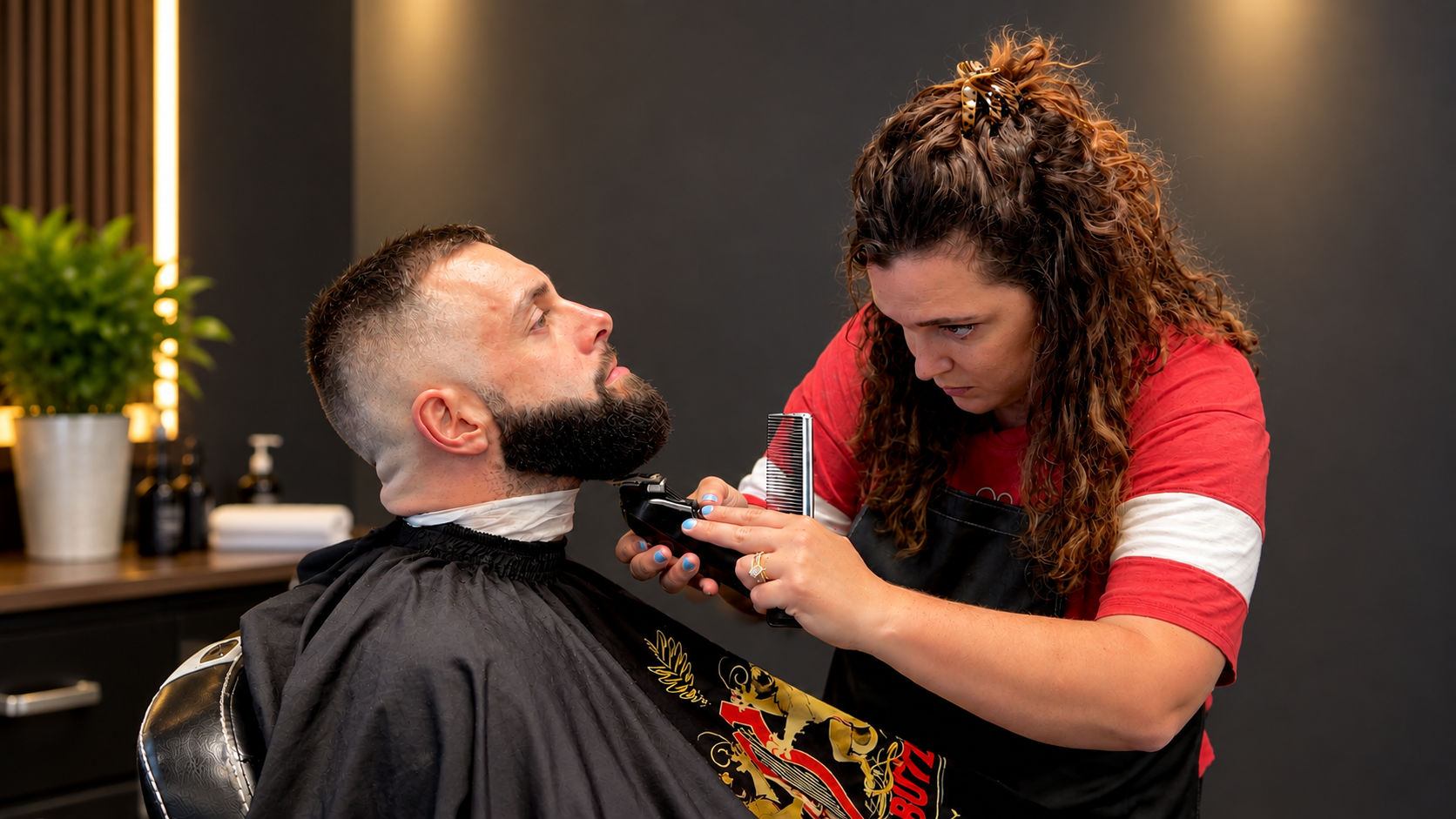 David Scott Weitz photographing a female barber at Players Barber Shop in Hatboro, Pennsylvania 
