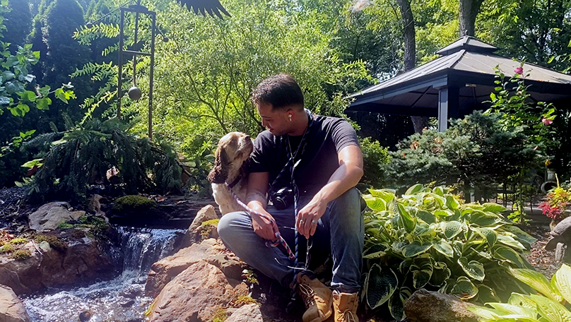  David Scott Weitz photographing a staff member with a dog at Janry Pet Resort 