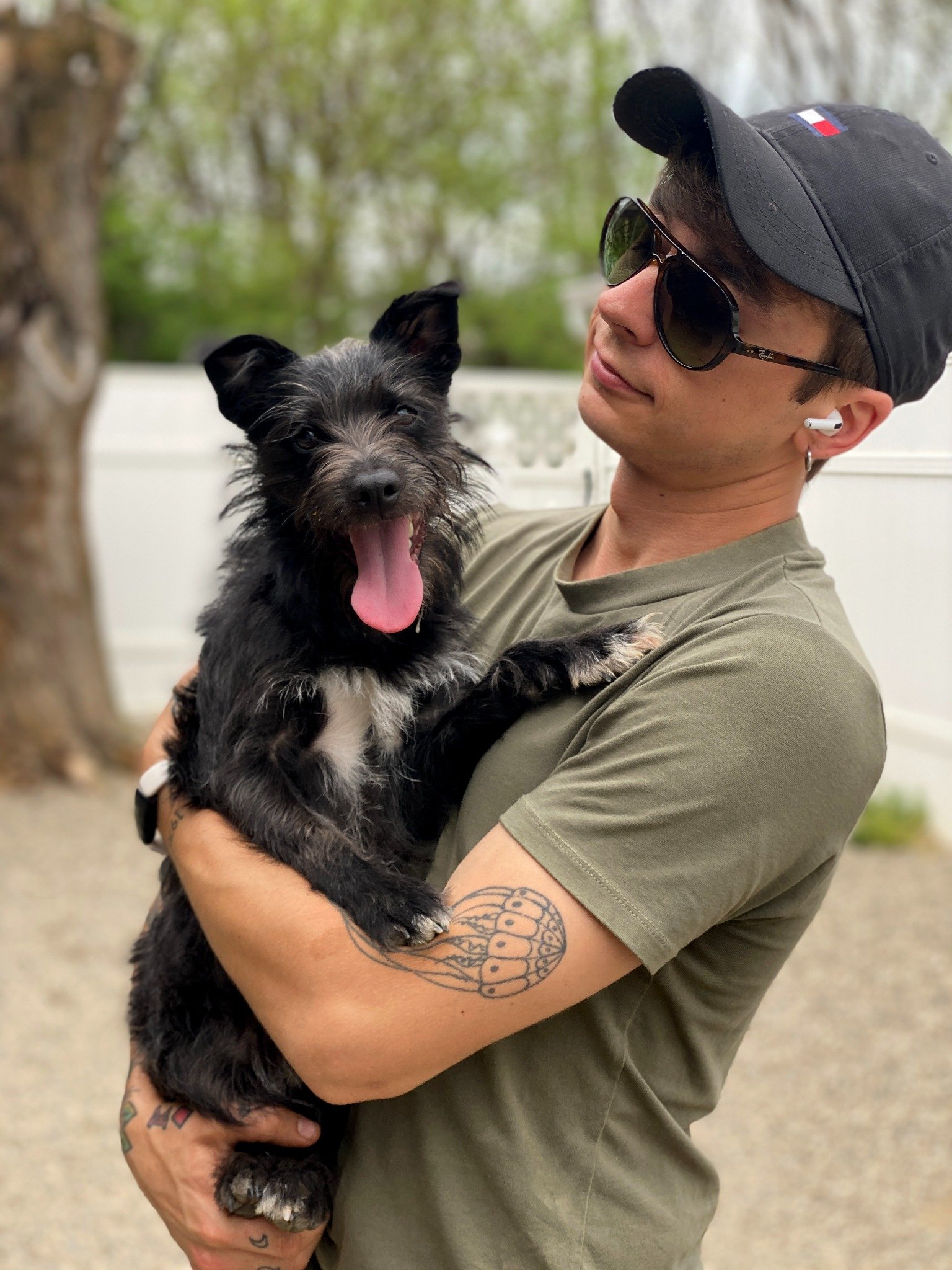 David Scott Weitz photographing a staff member with a dog at Janry Pet Resort 