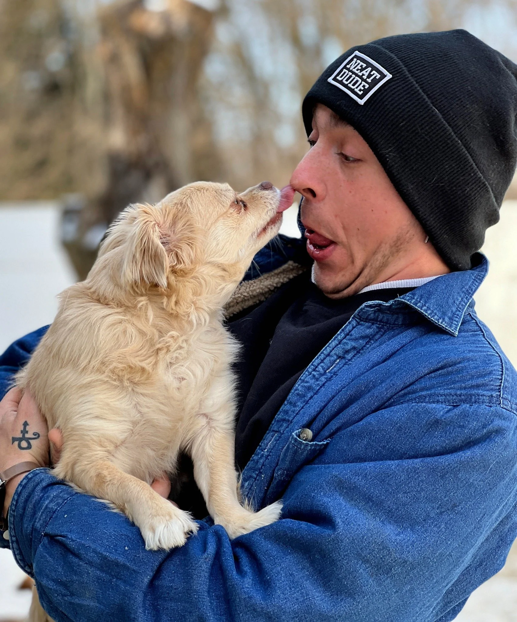 David Scott Weitz photographing a staff member with a dog at Janry Pet Resort 