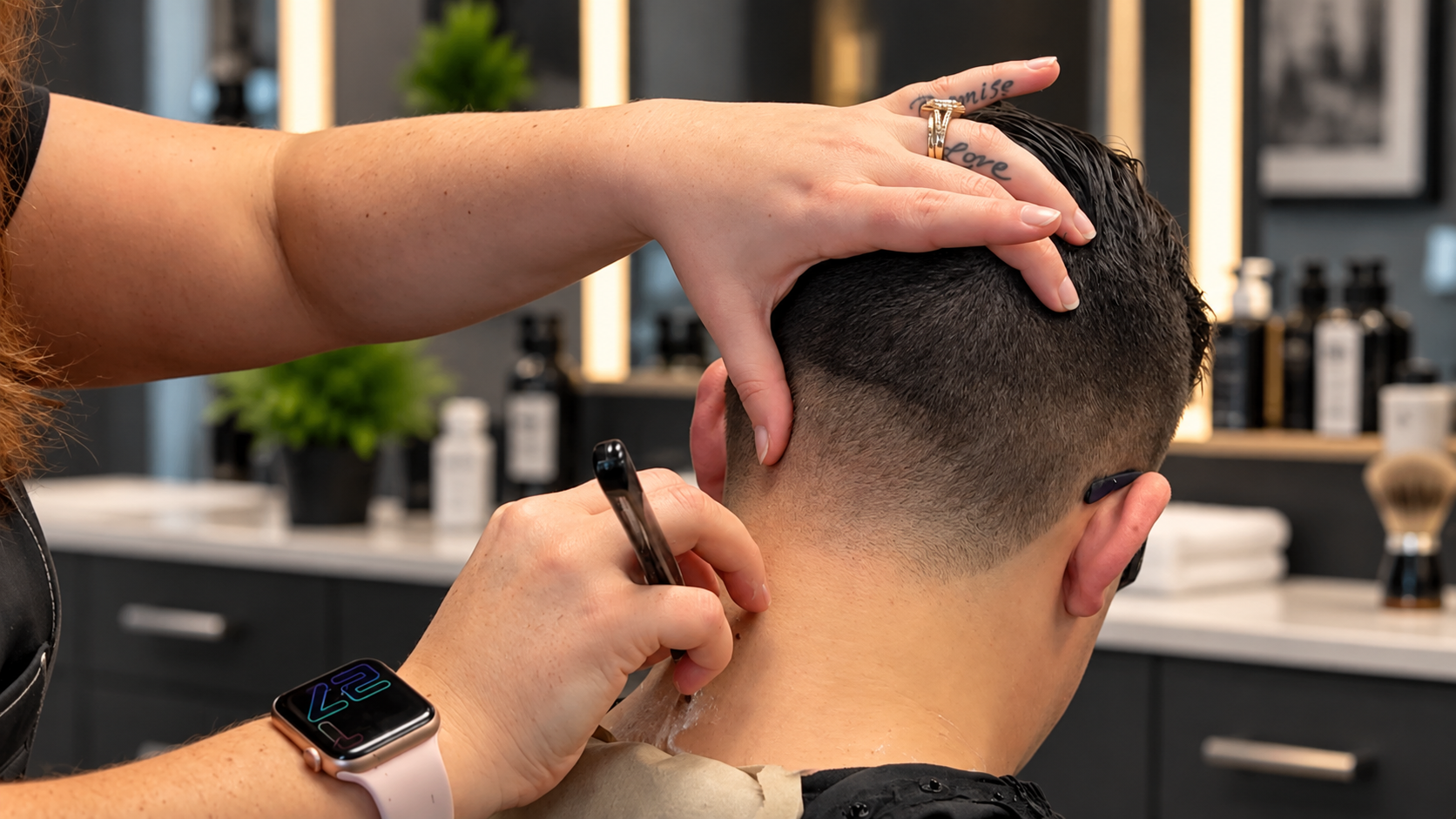 David Scott Weitz photographing a female barber at Players Barber Shop in Hatboro, Pennsylvania