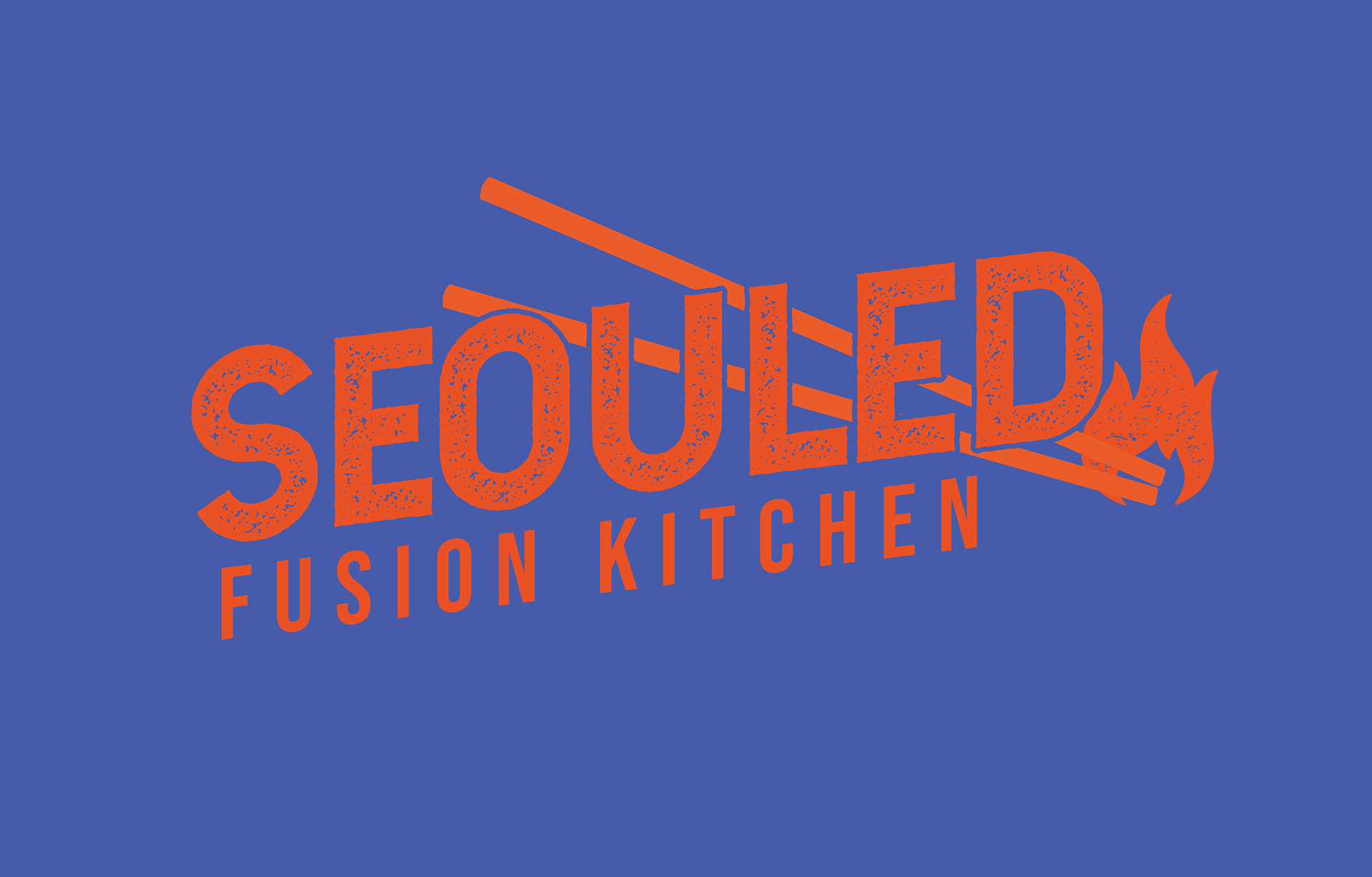 Logo for Seoul-ed Fusion Kitchen with the text styled in orange on a blue background.