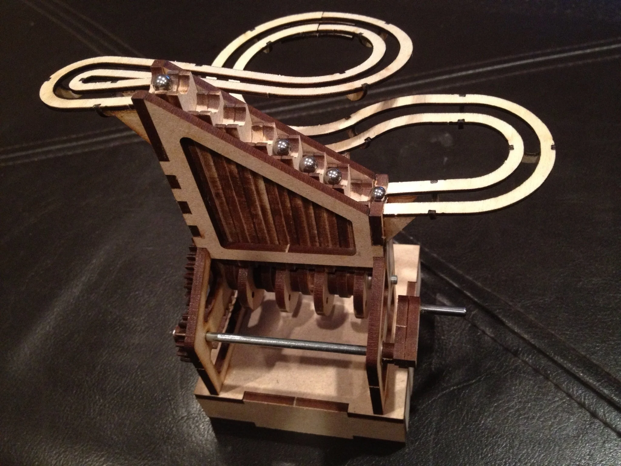 Wooden rolling ball sculpture