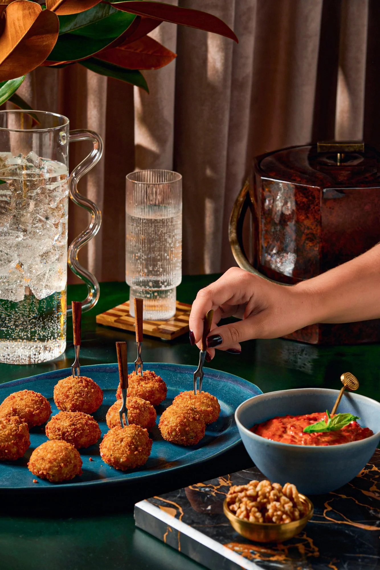 A holiday appetizer featuring walnuts in a festive party scene.