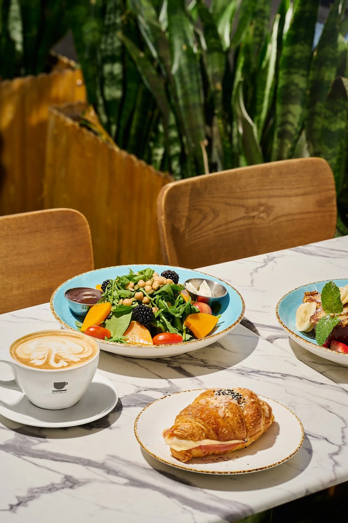Array of brunch dishes at Republik restaurant in Pasadena, California.