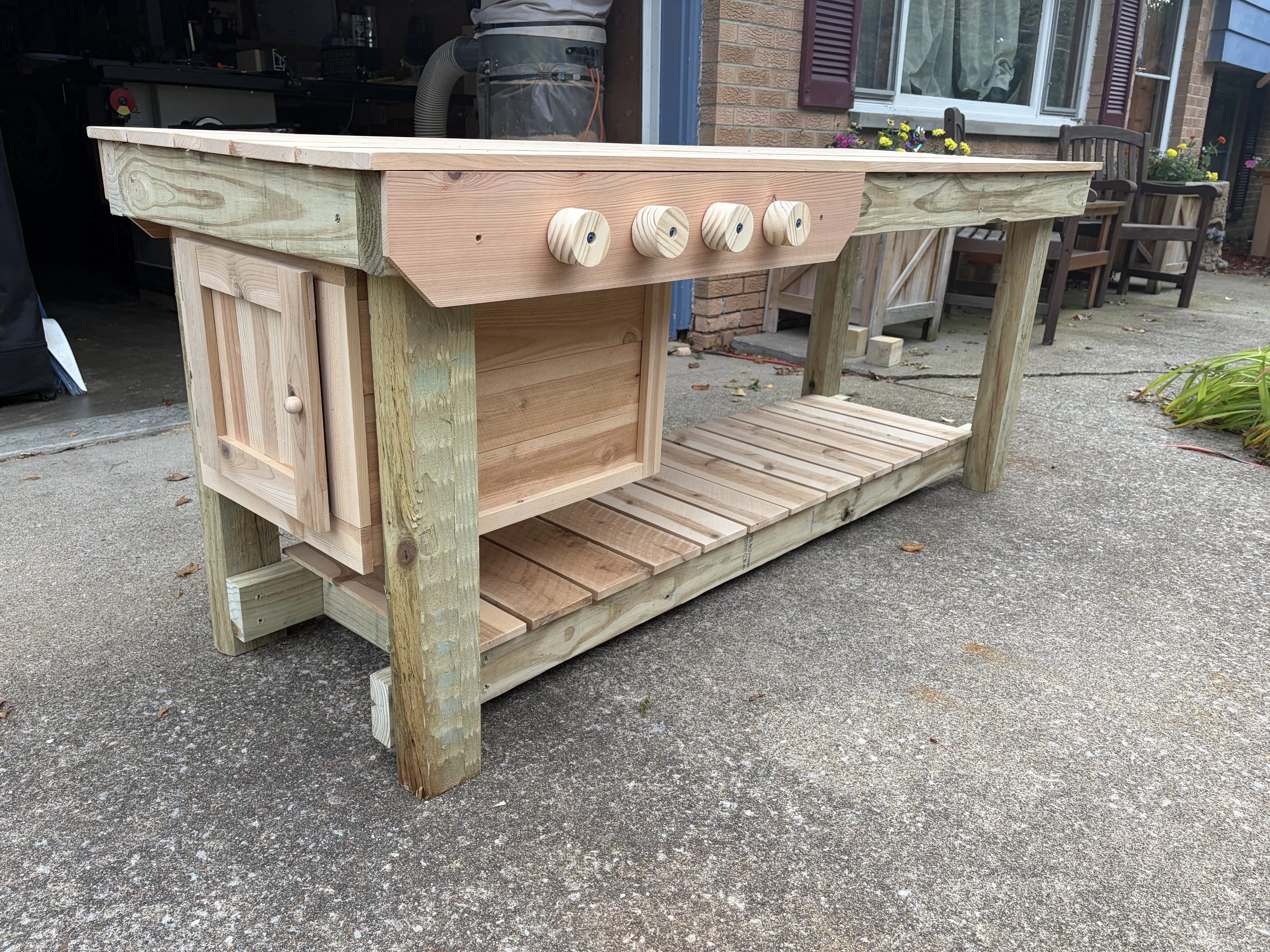 A Outdoor Mud Kitchen with play features