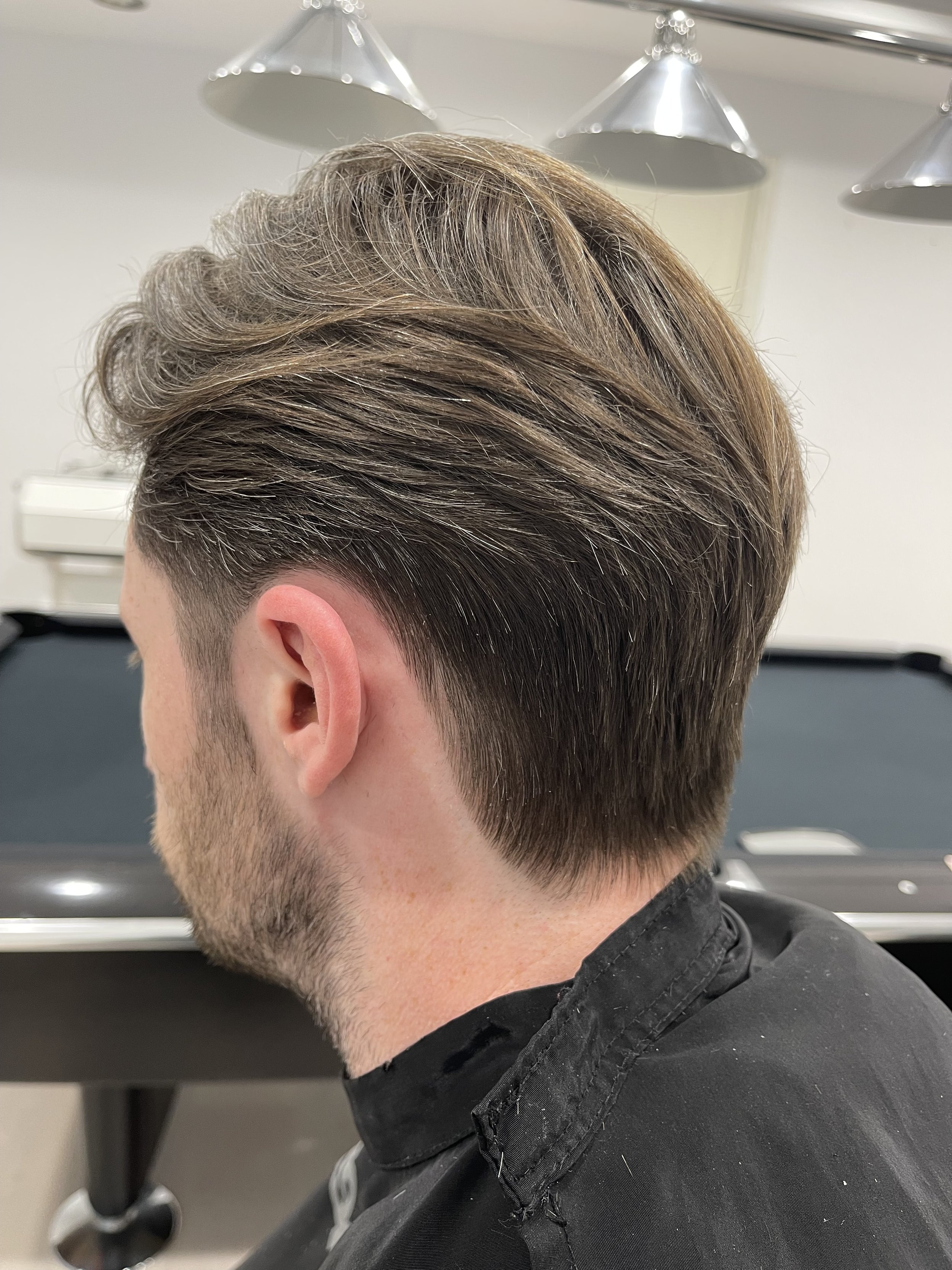 Modern men's haircut and professional grooming services at home in Marbella