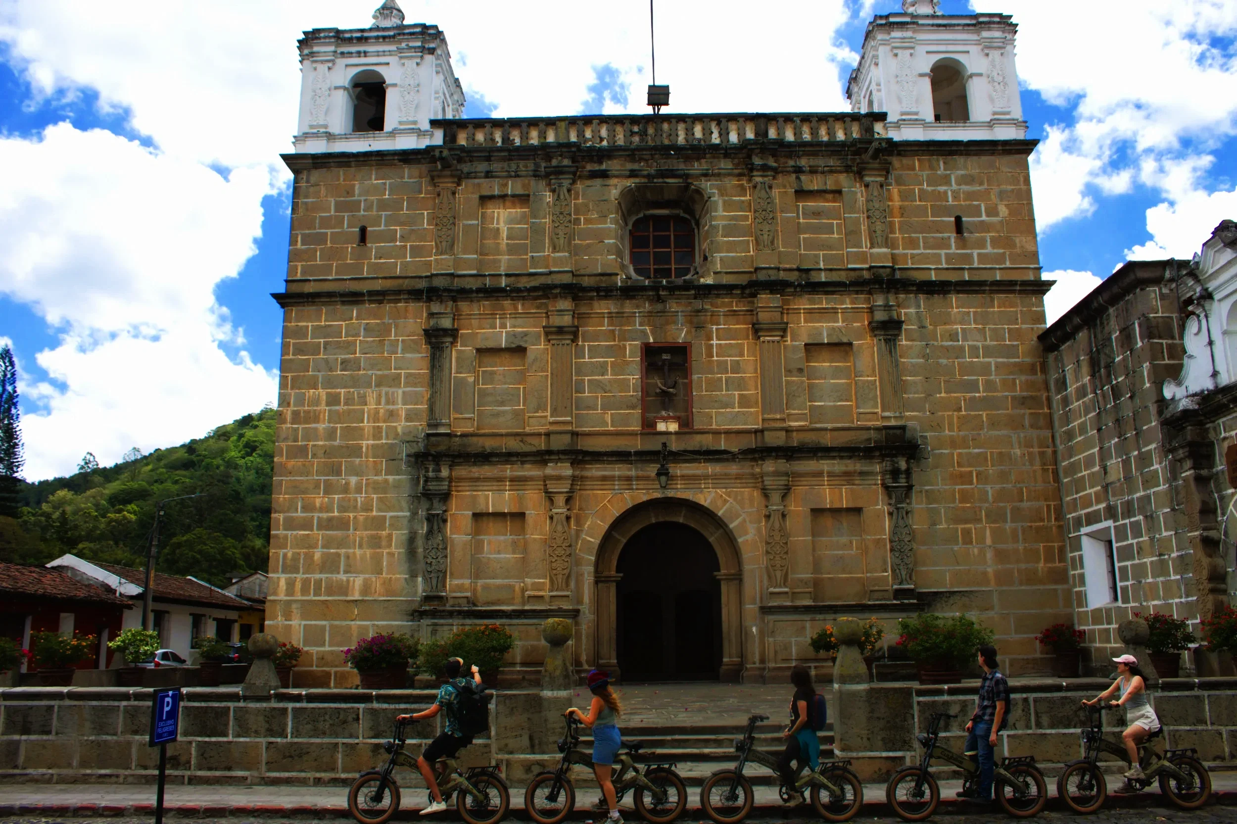 E-Bike tour group in front of a church in Antigua