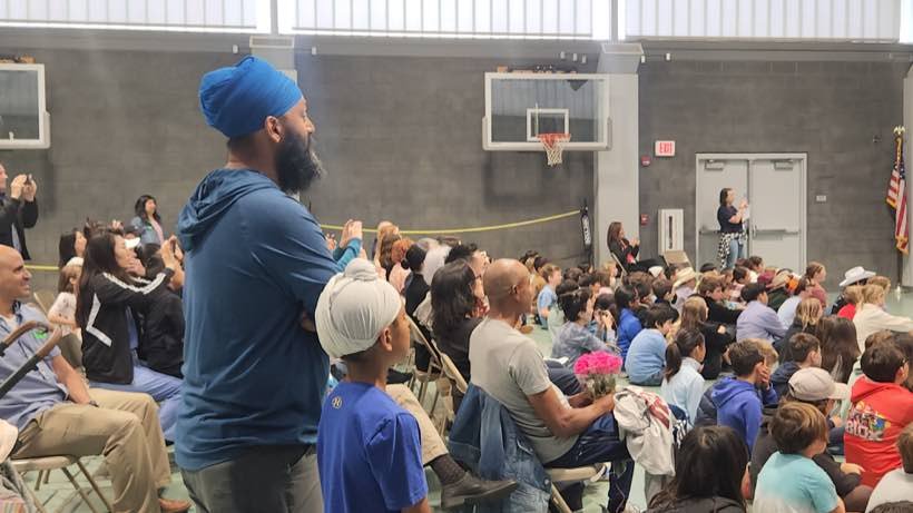 Amar Malik attending an LCUSD school assembly