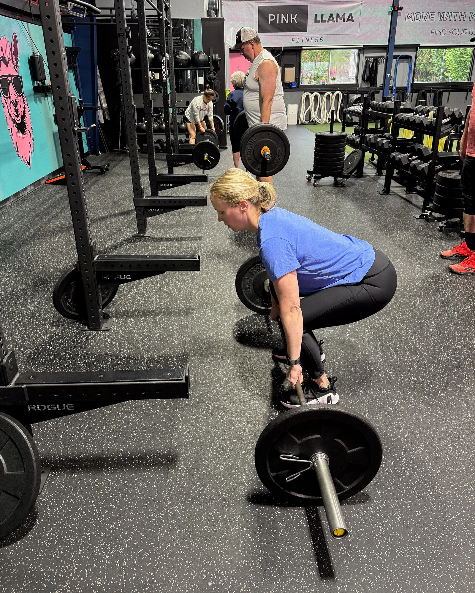Pink Llama Fitness member deadlifting during Group Training in Renton