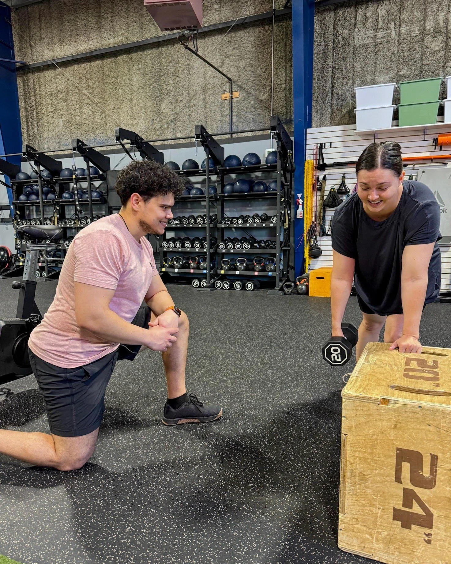 Pink Llama Fitness coach working one-on-one with a Personal Training member