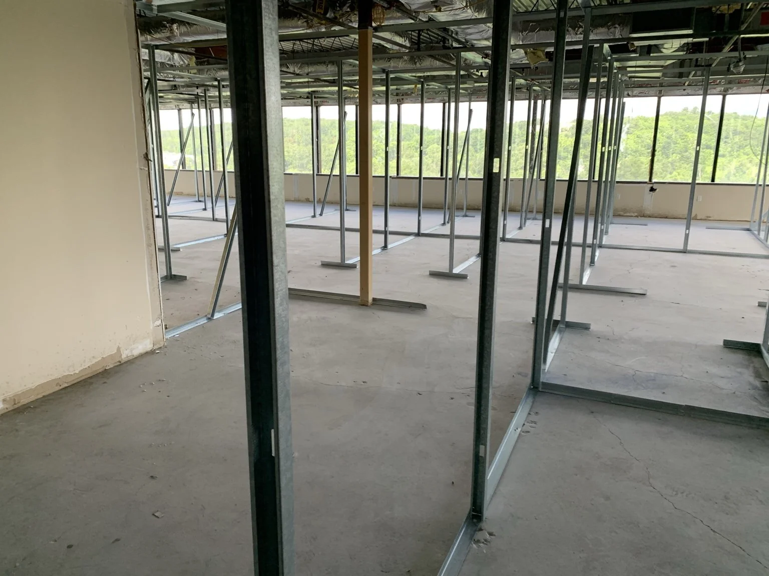 Interior construction of climate-controlled self-storage rooms inside the former Genzyme office building in Framingham, Massachusetts.