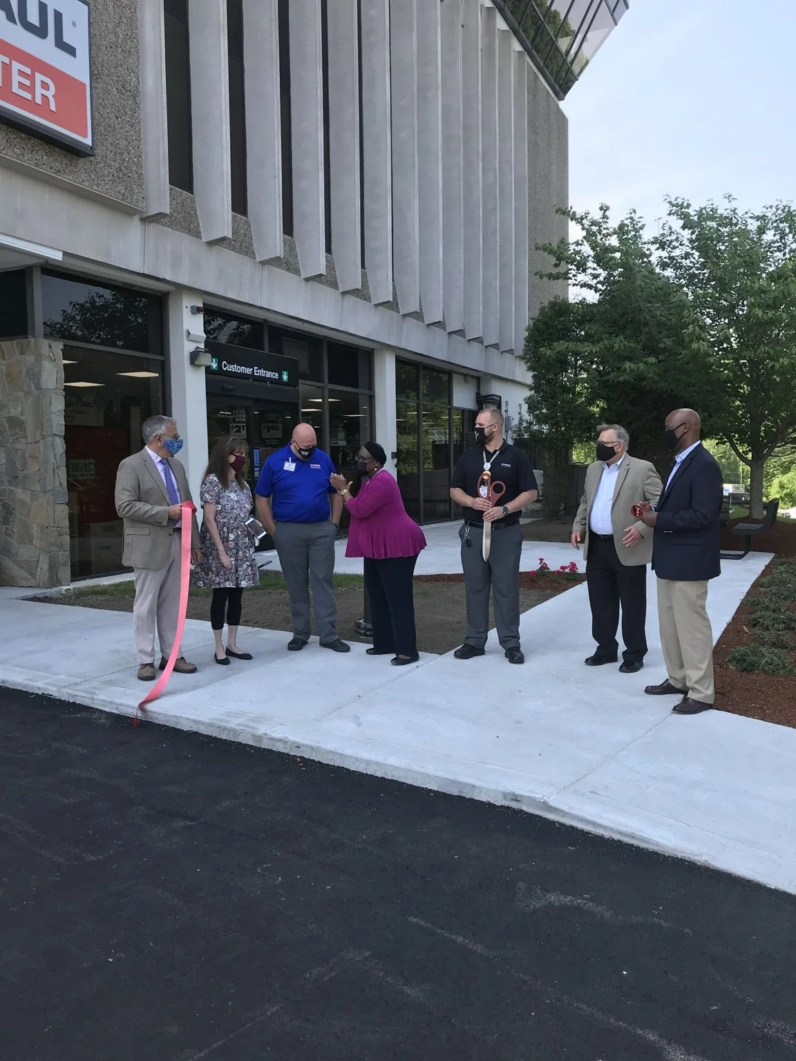 Local officials, community leaders and U-Haul team members at the Framingham self-storage ribbon-cutting celebration.