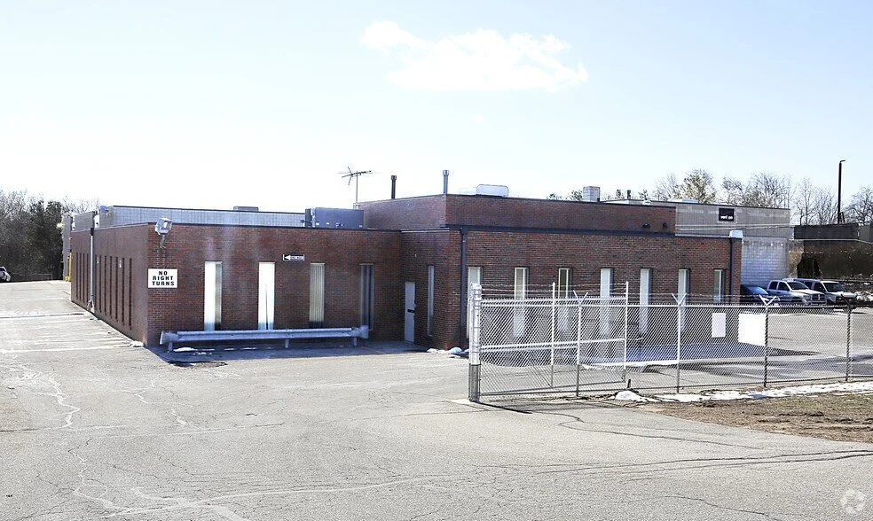 Former Verizon fleet-maintenance building at 99 Pleasant Valley Street in Methuen before redevelopment