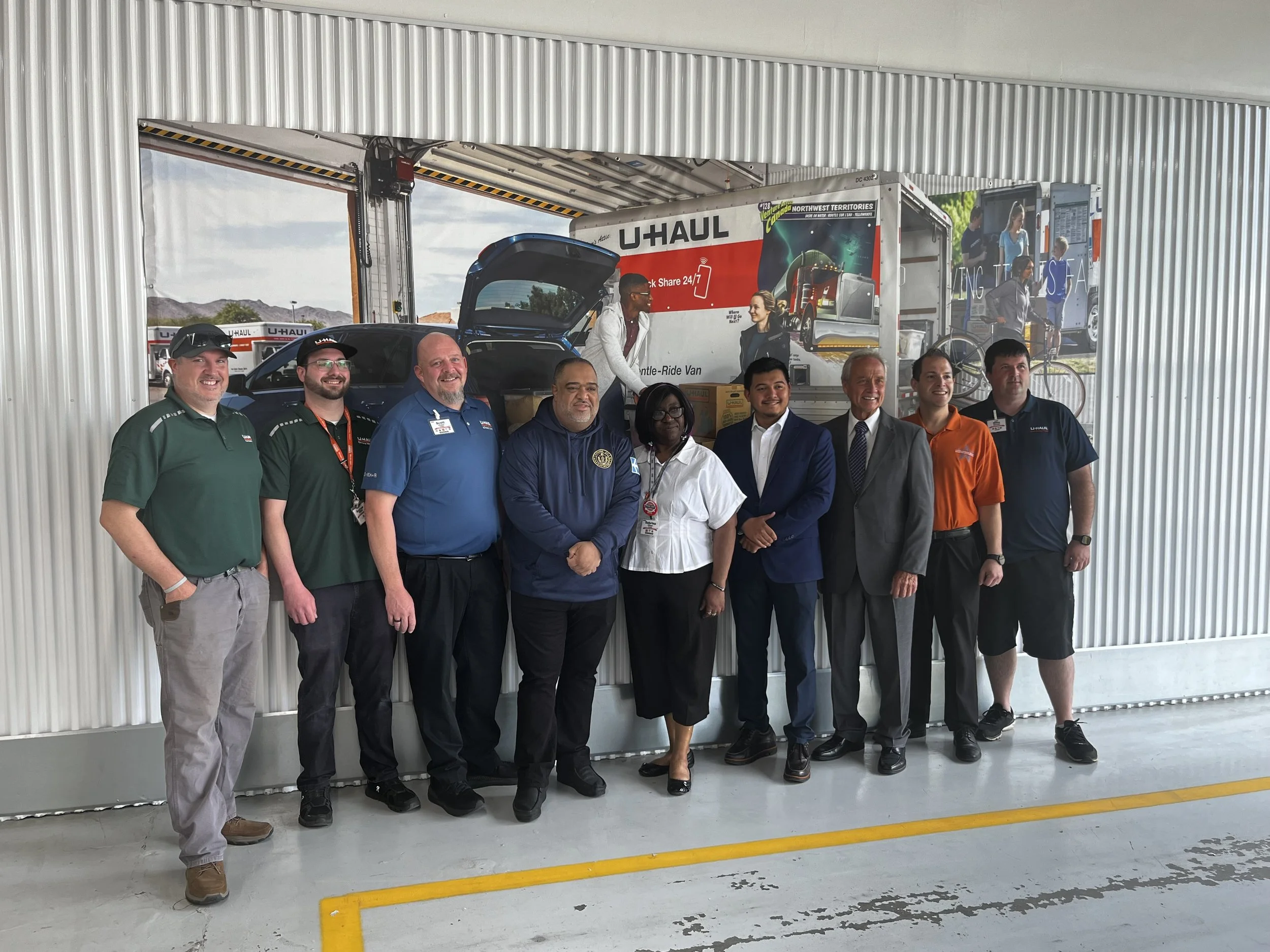U-Haul team and community representatives at the Methuen project ribbon-cutting event