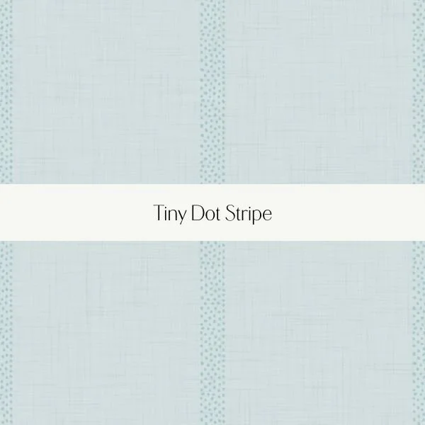 Light blue fabric with a tiny dot stripe pattern and a white band in the middle with the text 'Tiny Dot Stripe'.