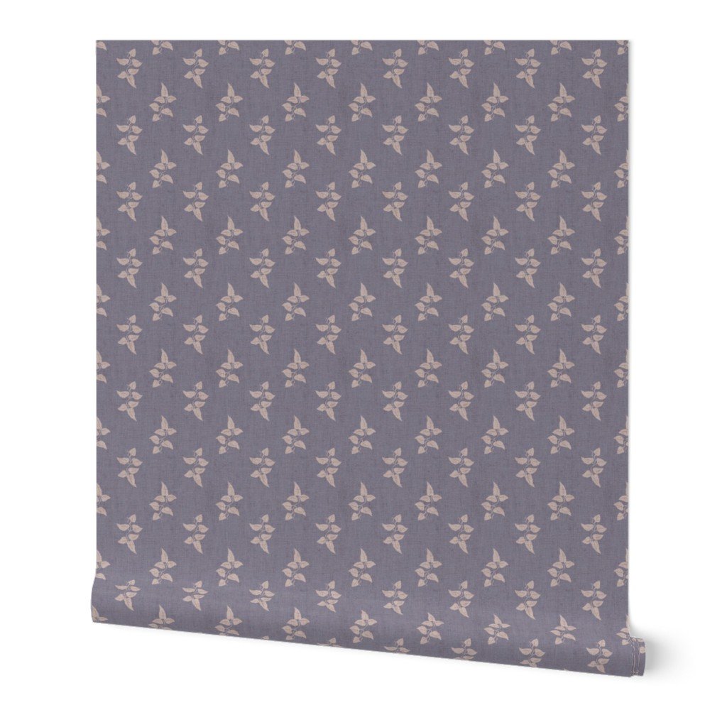 Muted heather-purple wallpaper roll featuring a delicate, repeating grid of tiny cream botanical sprigs.