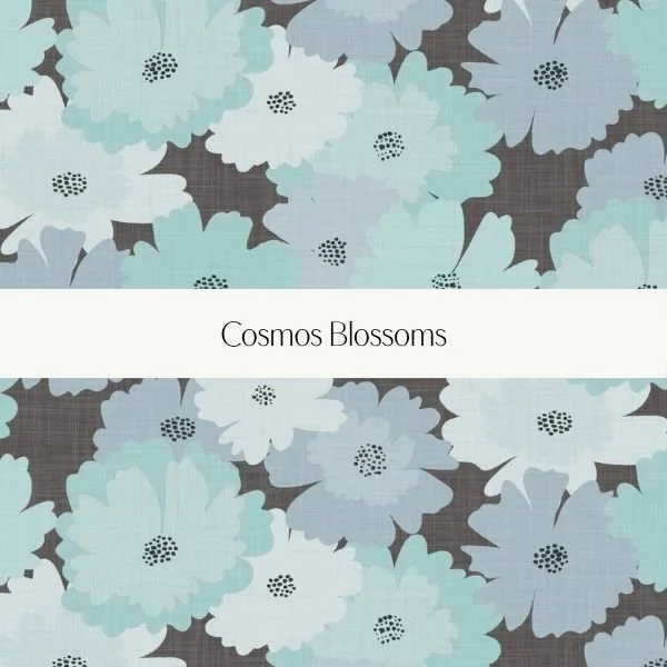 Cover of a book or decorative panel with a pattern of large, pastel blue and white flowers on a gray background, titled 'Cosmos Blossoms'.