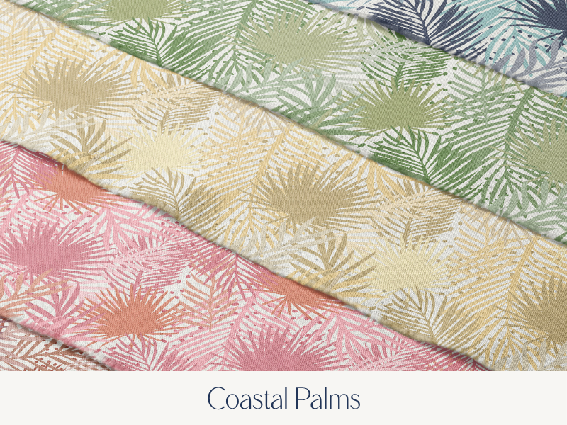 Four folded fabrics with palm leaf patterns in green, blue, yellow, and pink colors.