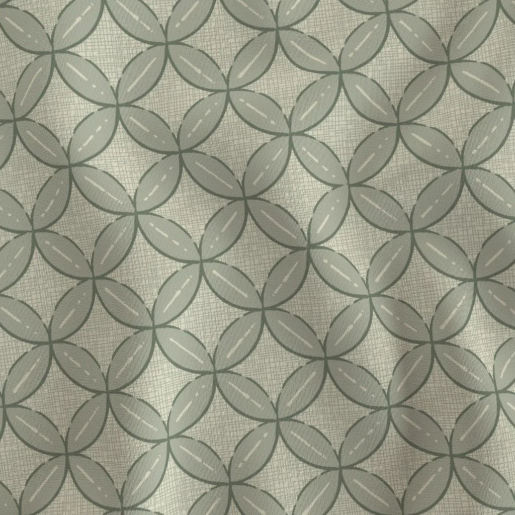A repeating pattern of gray and beige circles with leaf shapes and dashed lines, creating a geometric design.