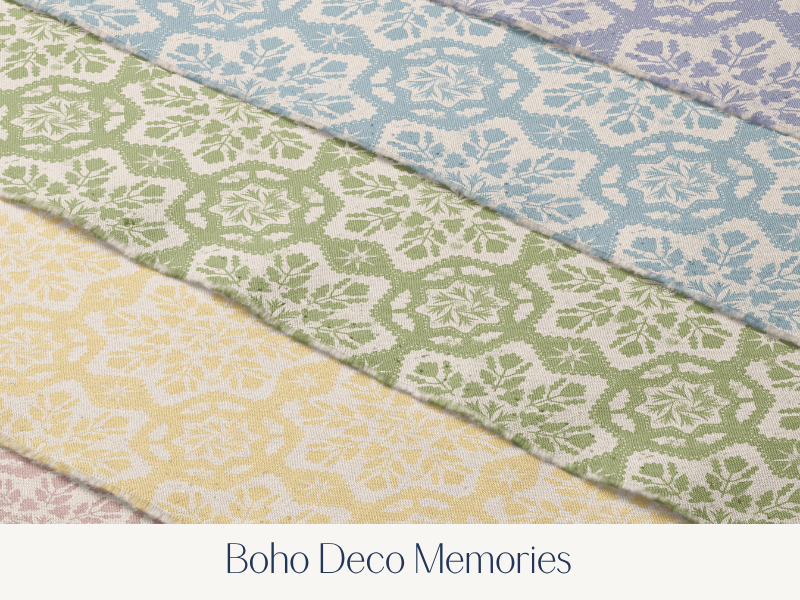 Close-up view of colorful fabric with floral patterns in pastel colors, labeled 'Boho Deco Memories'.