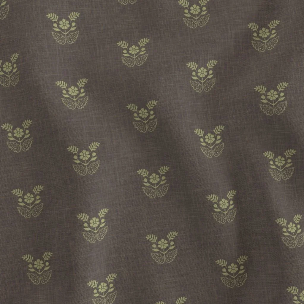 Dark brown fabric with a repeating light green floral pattern.