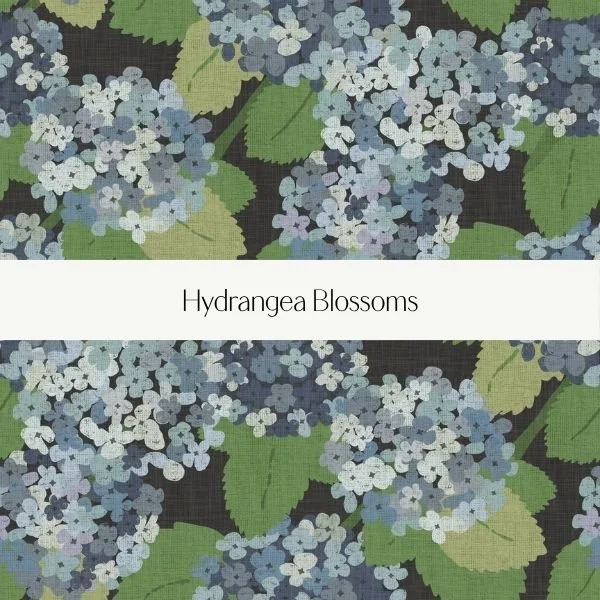 Pattern of hydrangea blossoms in shades of blue, purple, and white with green leaves on a dark background.