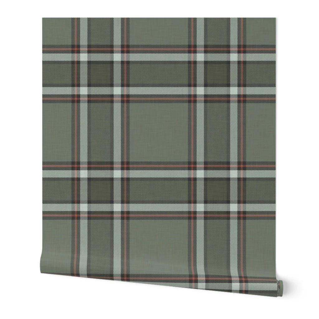 Wallpaper roll featuring a classic tartan plaid pattern in sage green, accented with intersecting off-white and rust-orange lines.