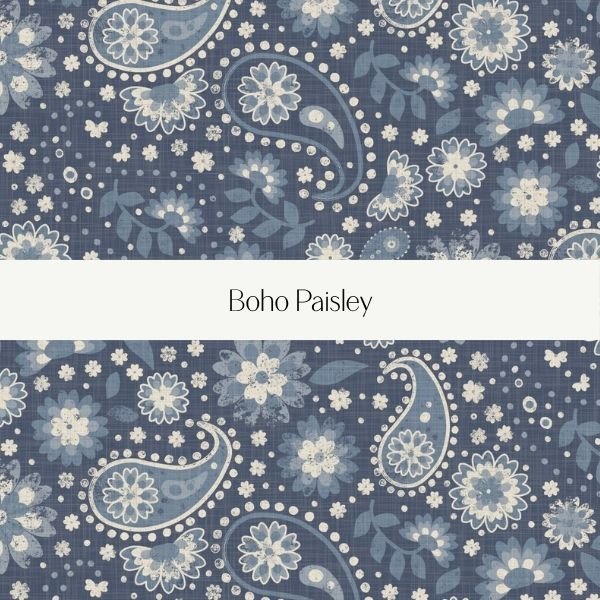 Close-up of a fabric with a blue and white boho paisley floral pattern.