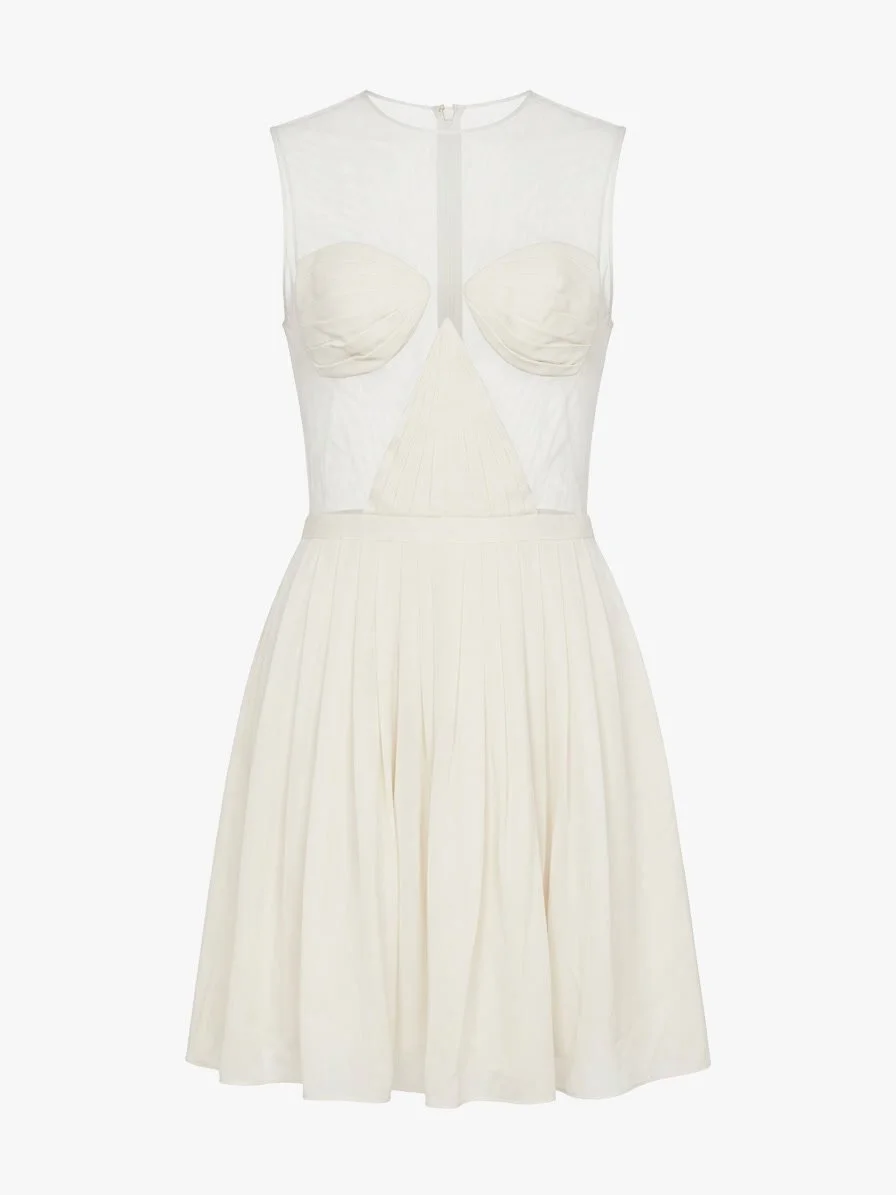 Cushnie Et Ochs Resort 2013 runway look 11. White chiffon and mesh mini dress. 