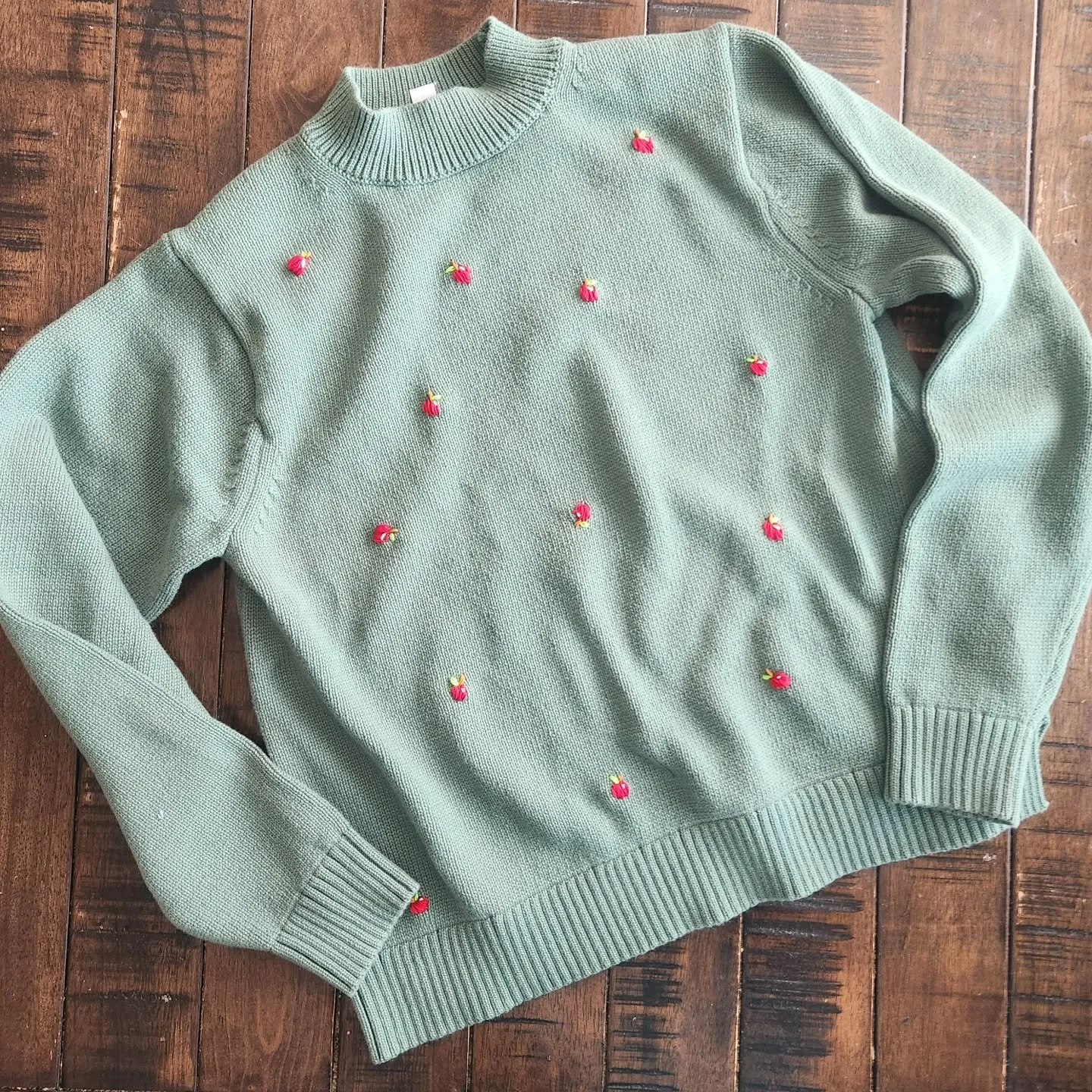 An apple a day, back to school, or maybe temptation...
Bright red embroidered apples on upcycled knit sweater.