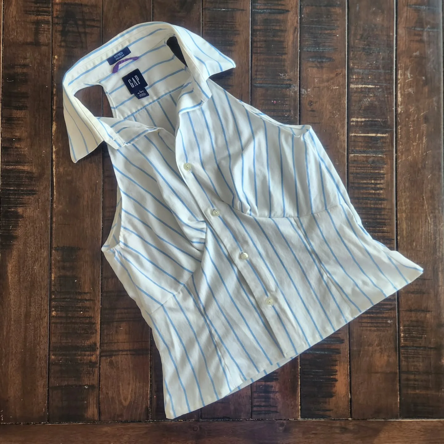 Sleaveless collared shirt with sculpted bust pleats.  @lizziedesignstudio Valentine Top pattern reimagined from a men's upcycled buttondown.