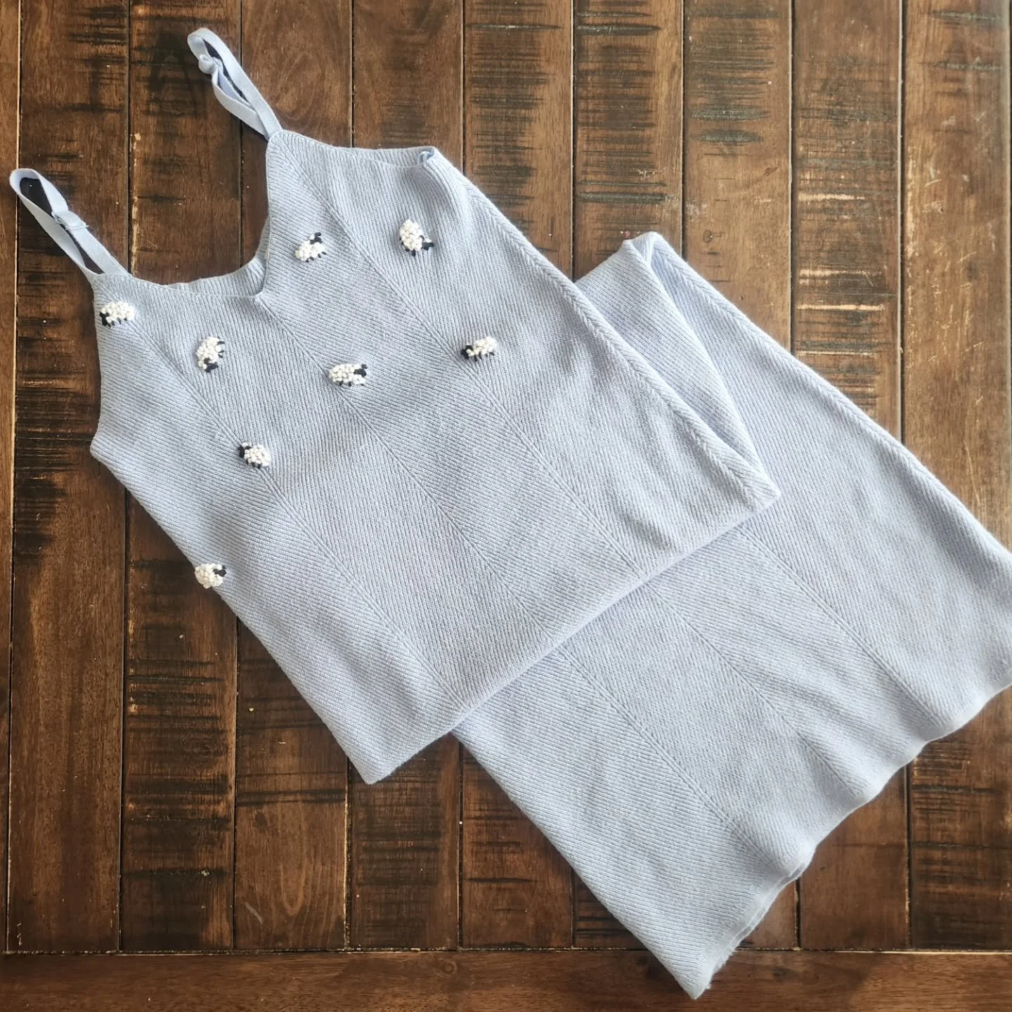 Zzzzzzz....embroidered sheep on upcycled knitted light blue bodycon dress.  Should I add a black sheep?