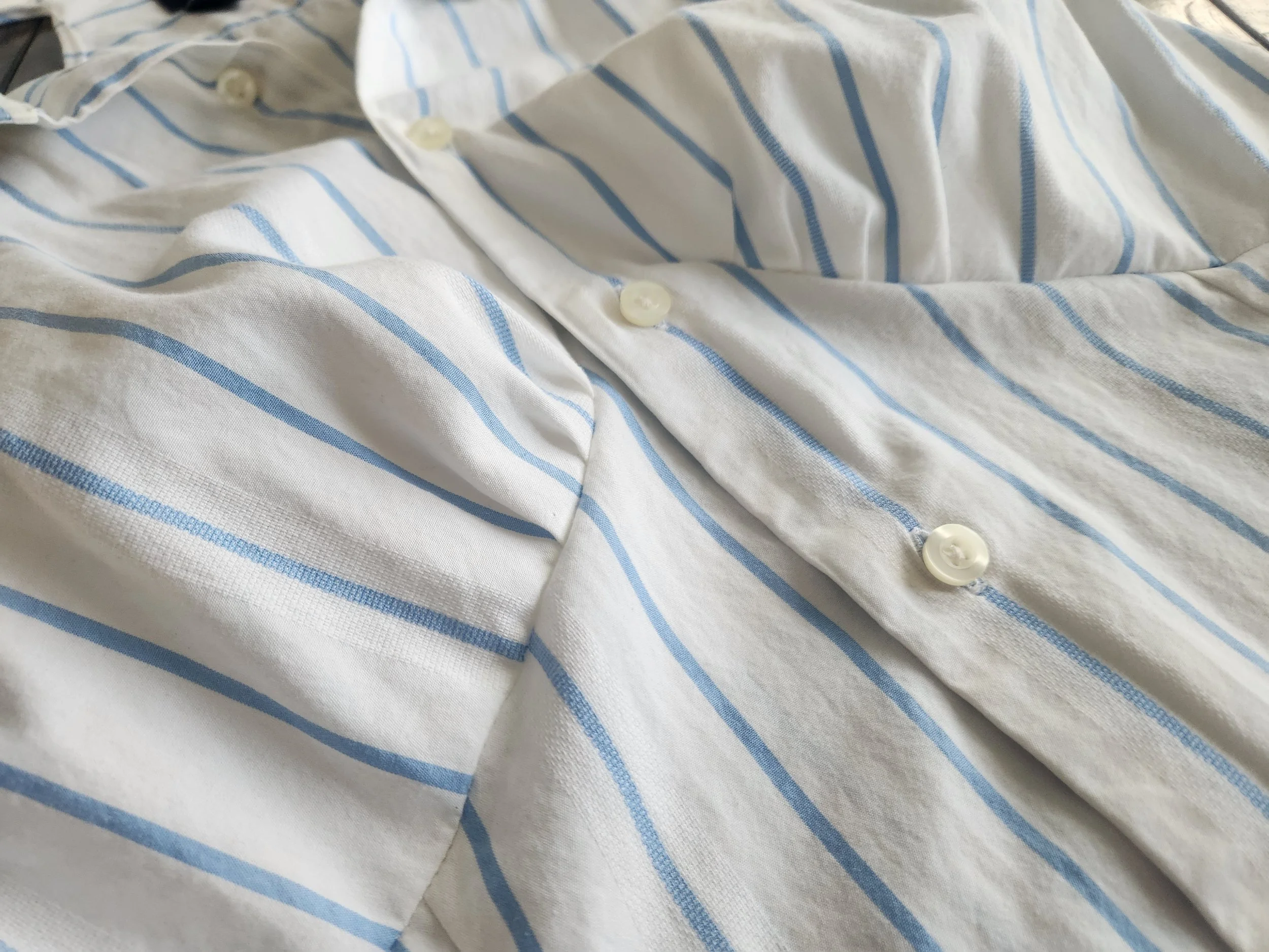 Of Character upcycled white with blue stripe reimagined men's button down women's sleaveless top close up bust detail.jpg