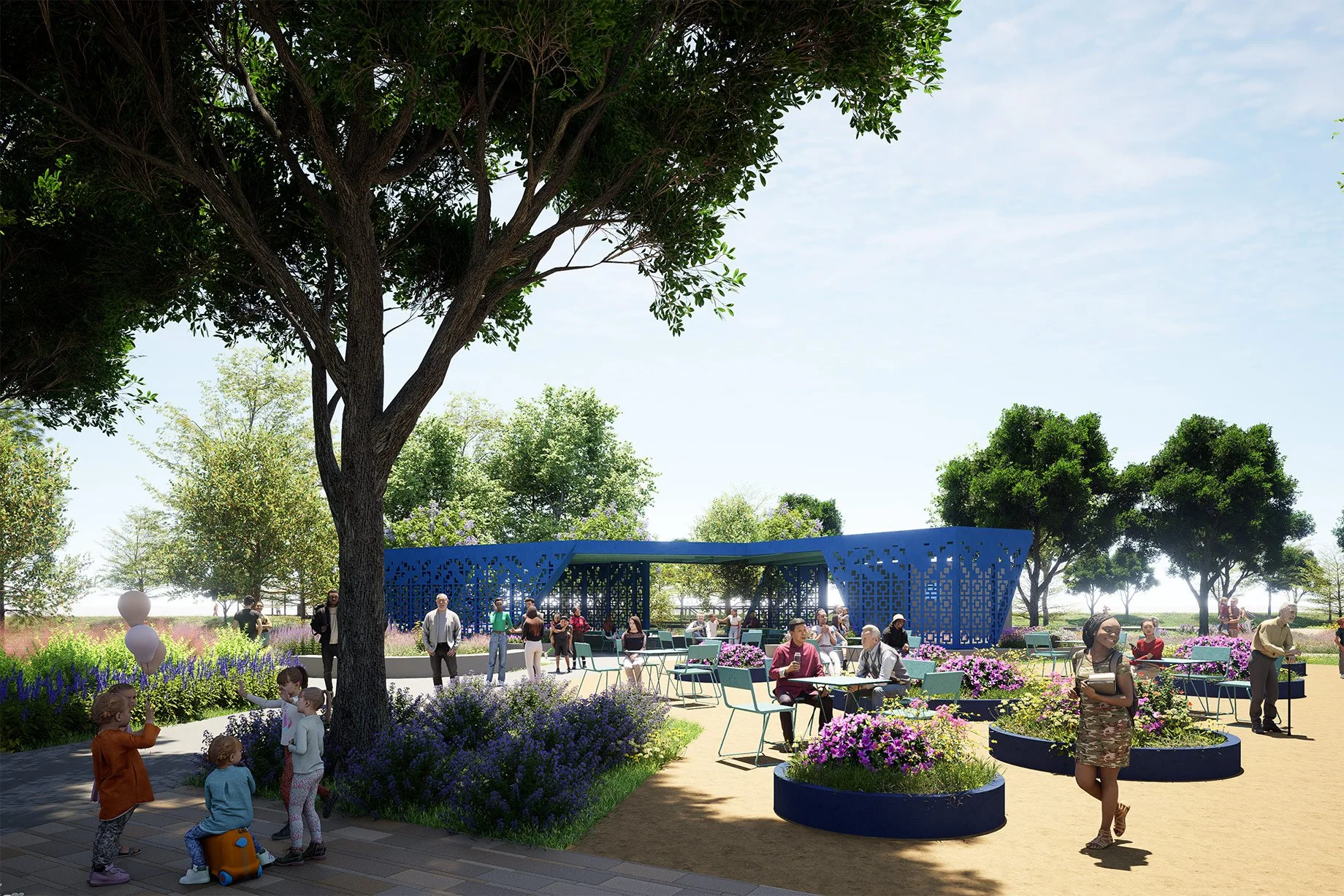 A vibrant outdoor park scene with a large tree in the foreground and groups of people enjoying the sunny day. The park features a modern blue pavilion with people sitting and socializing, surrounded by colorful flowers and lush greenery.