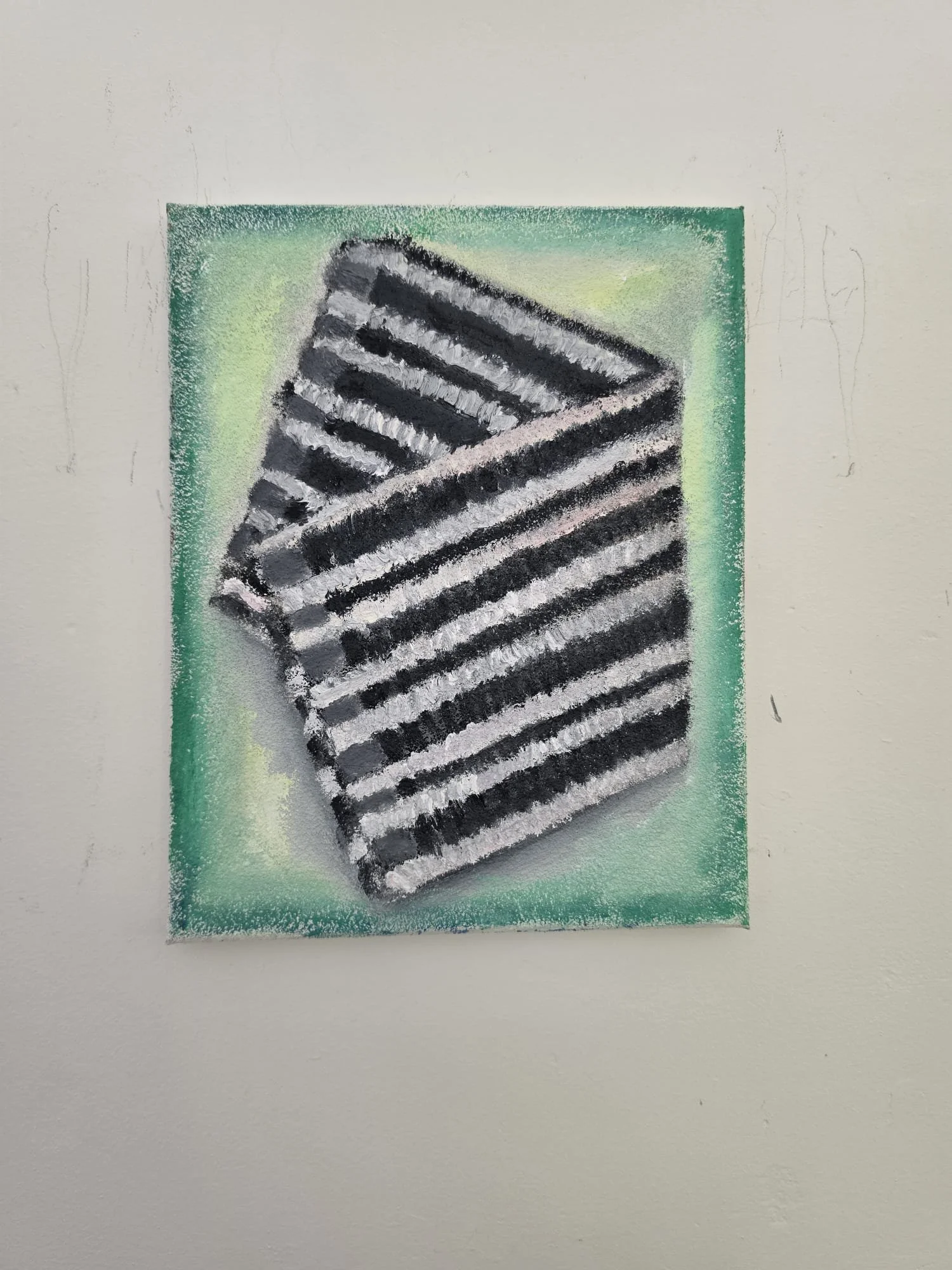A framed painting of a black and white dishcloth on a green background.