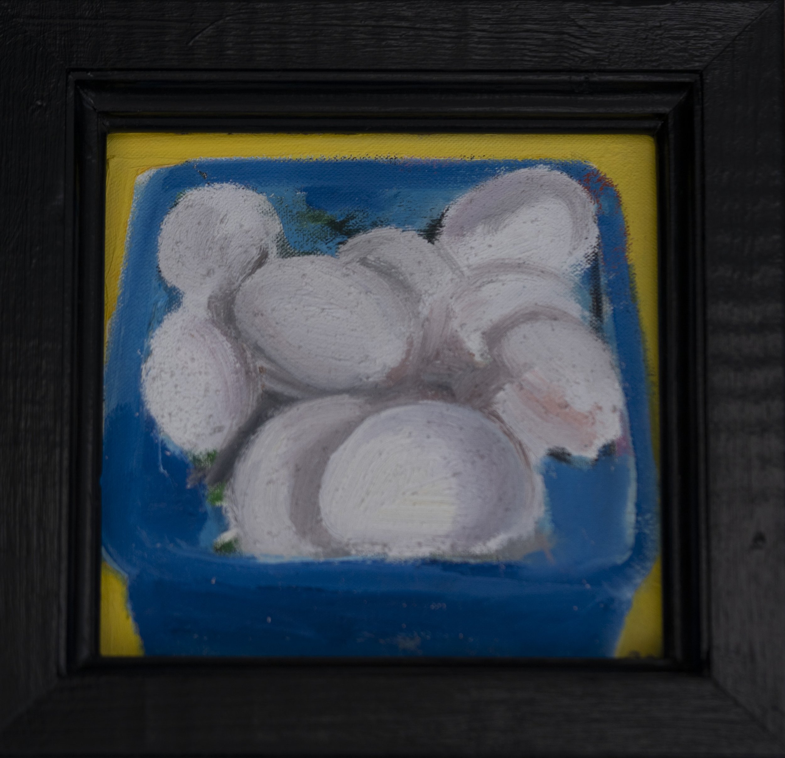 A framed painting of mushrooms in a blue container on a yellow background.