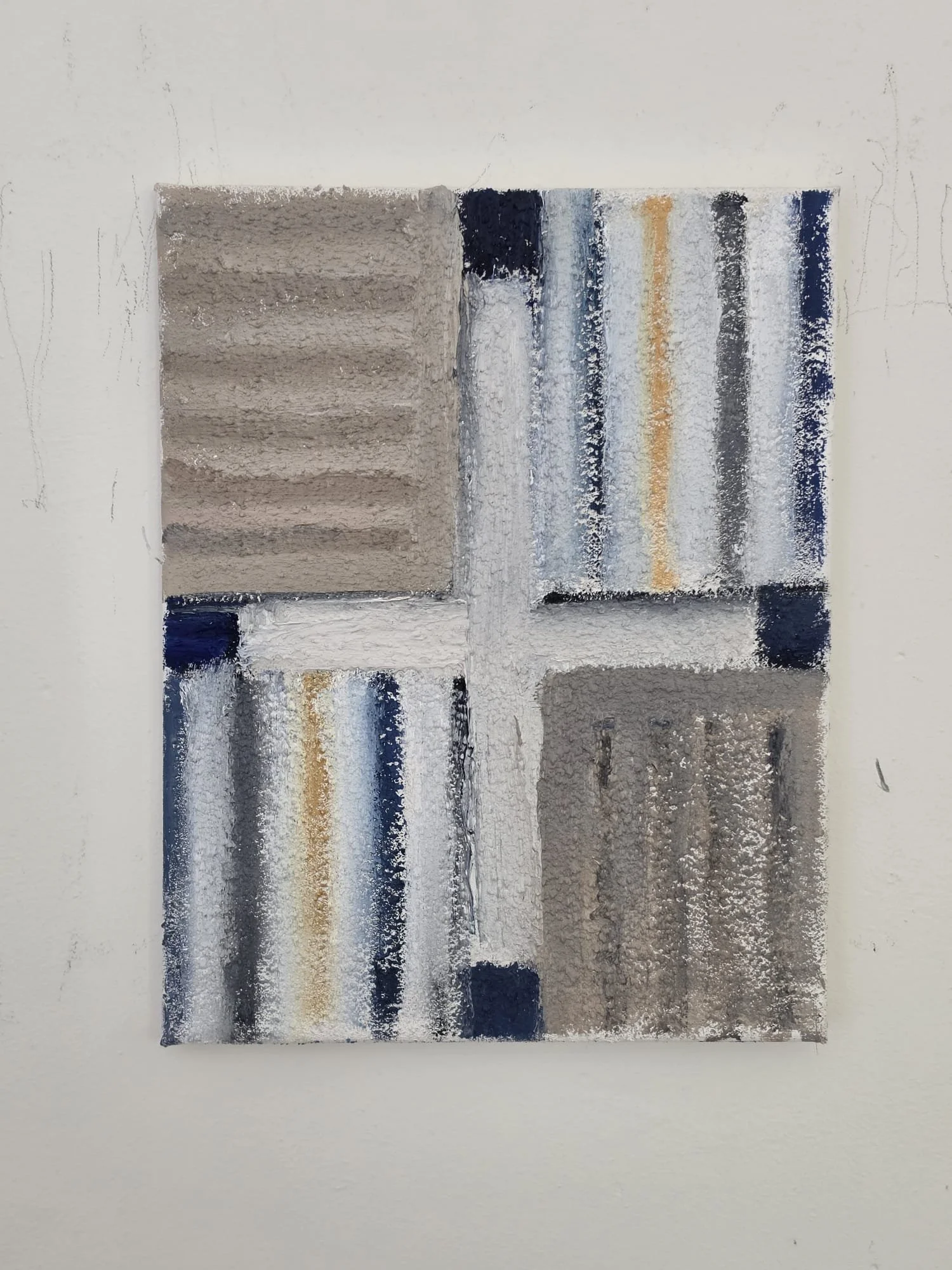 A framed painting of a four dishcloths.