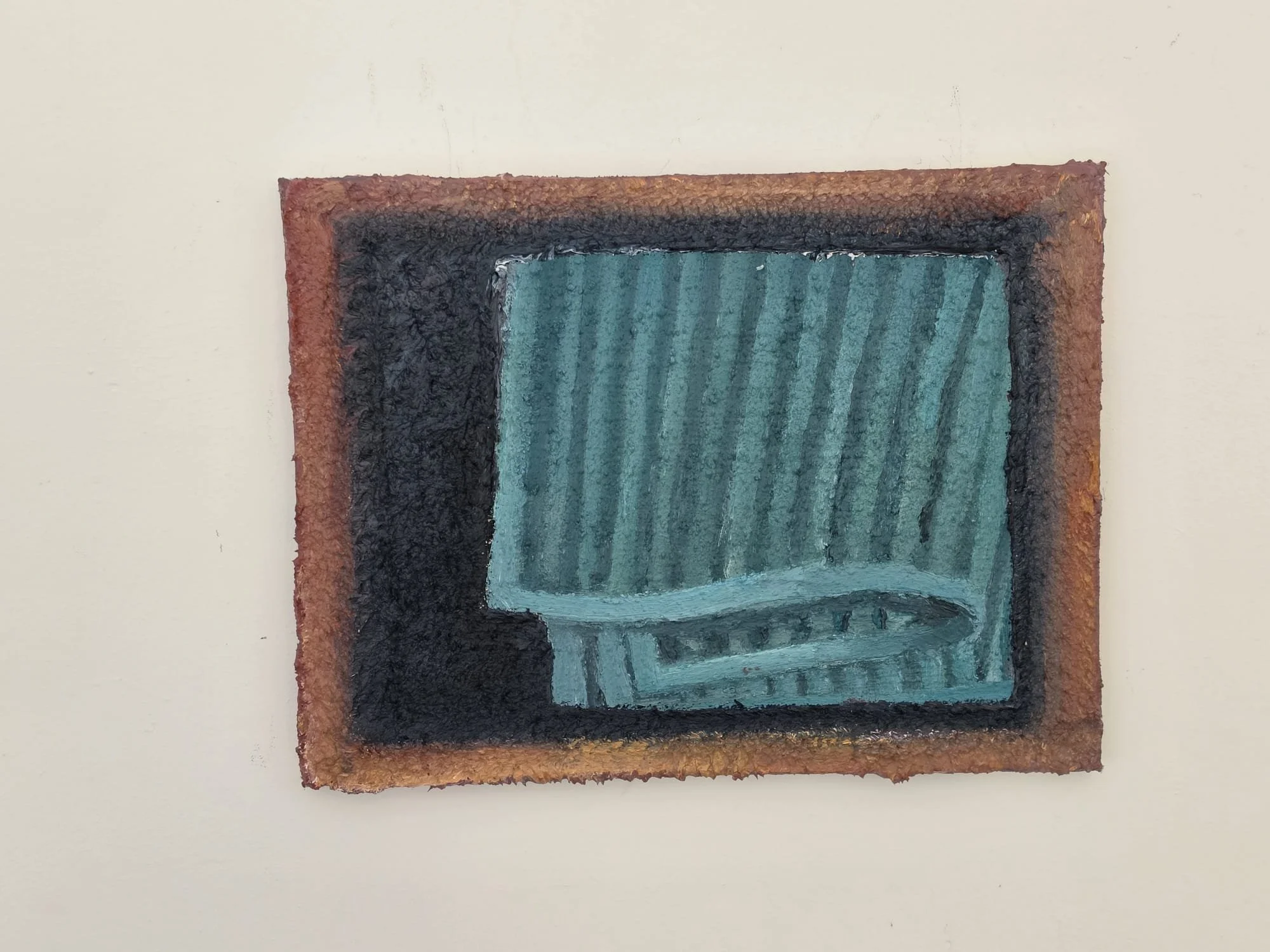 A framed painting of a cyan dishcloth on a black background.