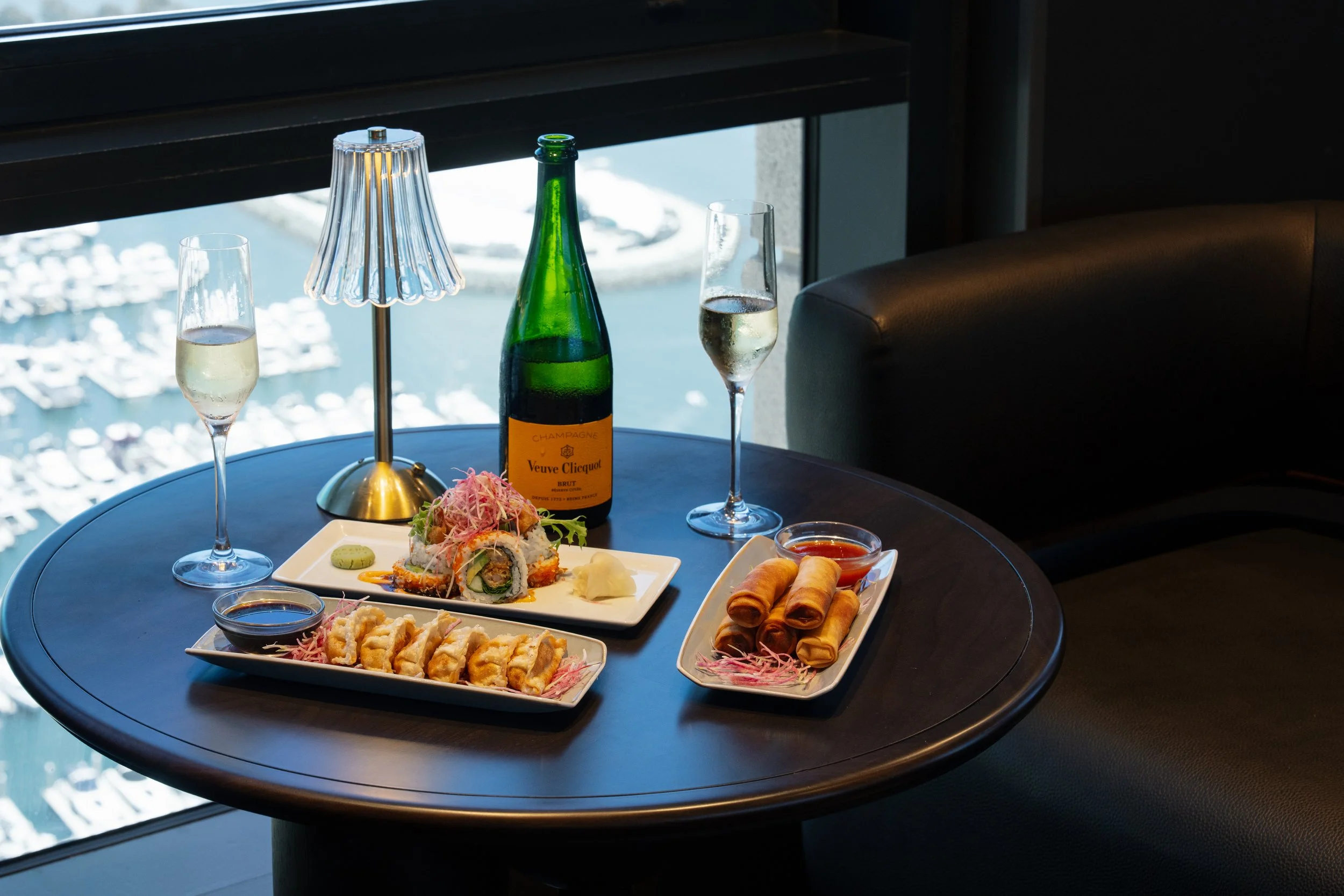  
    Shared Around  The Table  
    Led by an ambitious beverage program, Top of the Hyatt’s menus are designed to change. Rotating cocktails explore new concepts, ingredients and techniques, while a food menu designed to complement the cocktail pro