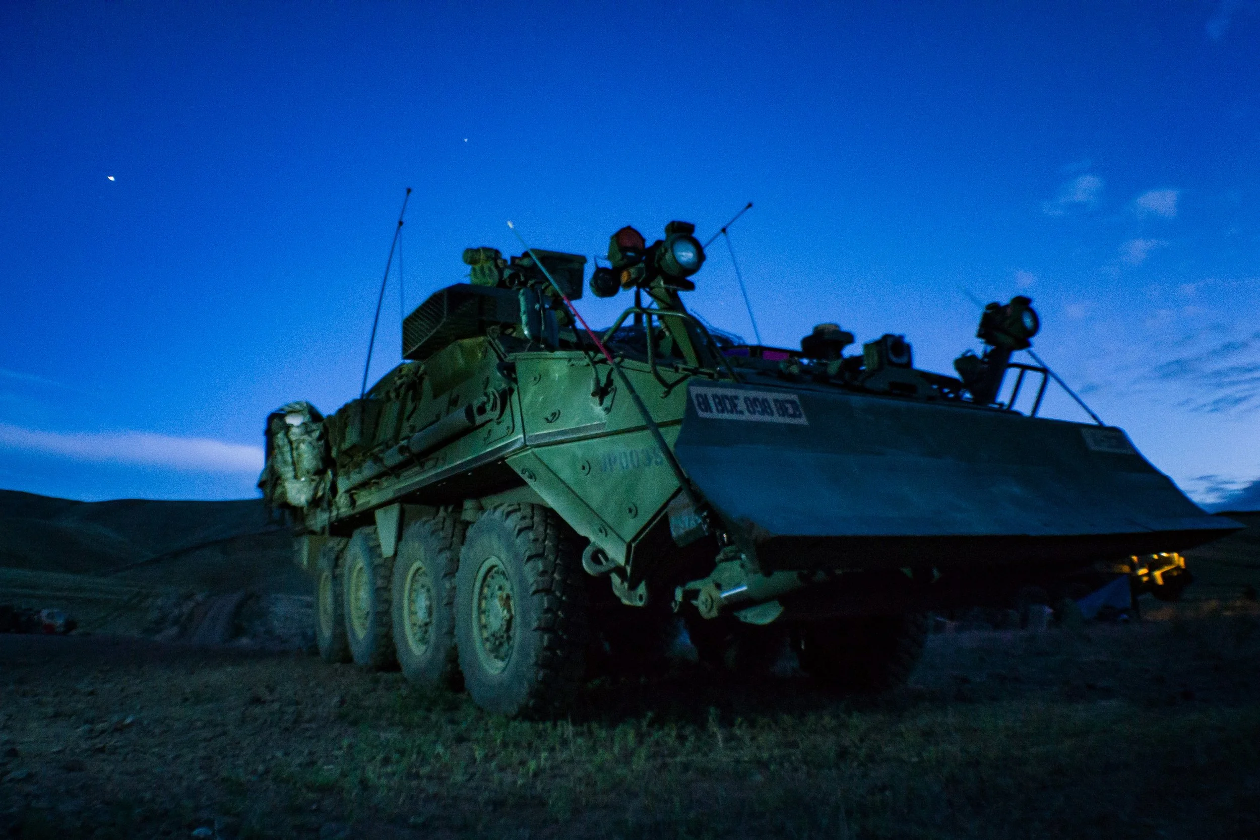 An M1132 Engineer Squad Vehicle belonging to Alpha Company, 898th Brigade Engineer Battalion, 81st Stryker Brigade Combat Team, sits under the night sky on a demolitions range at Yakima Training Center, Yakima, Wash., July 12, 2018. The M1132 is the 